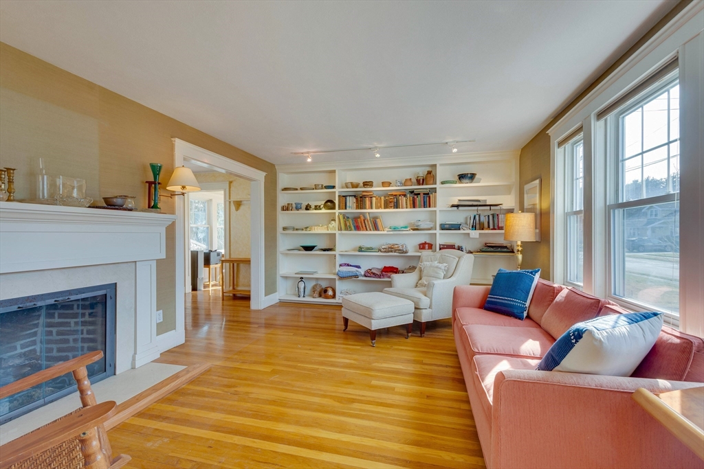 32 Emerson Road Needham, MA 02492 - Photo 5 of 27 a living room with furniture fireplace and a large window