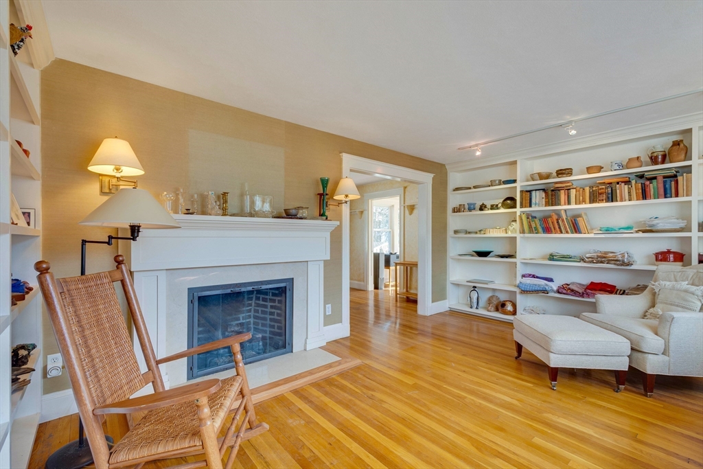 32 Emerson Road Needham, MA 02492 - Photo 7 of 27 a living room with furniture and a fireplace