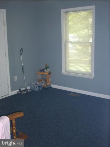 23642 Myrtle Point Road California, MD 20619 - Photo 11 of 21 Main Level Children's Play Room