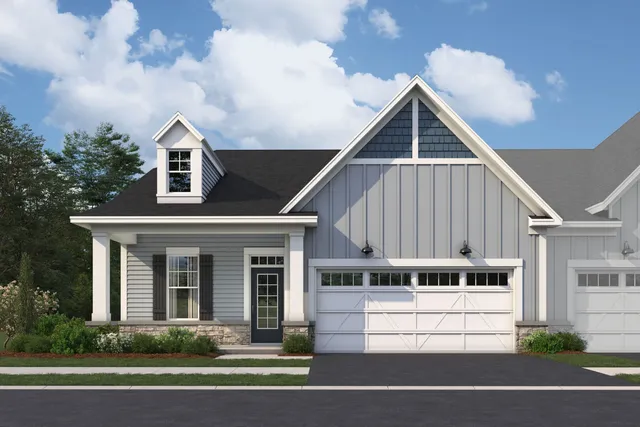 a view of a house with a yard and plants