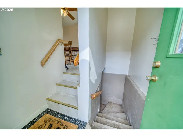 a view of a livingroom with furniture and cabinet