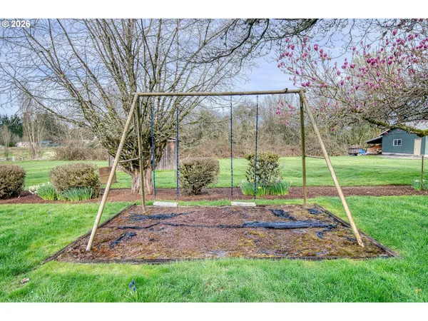 a backyard of a house with lots of green space