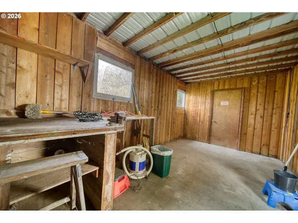 a picture of a bathroom with a shower