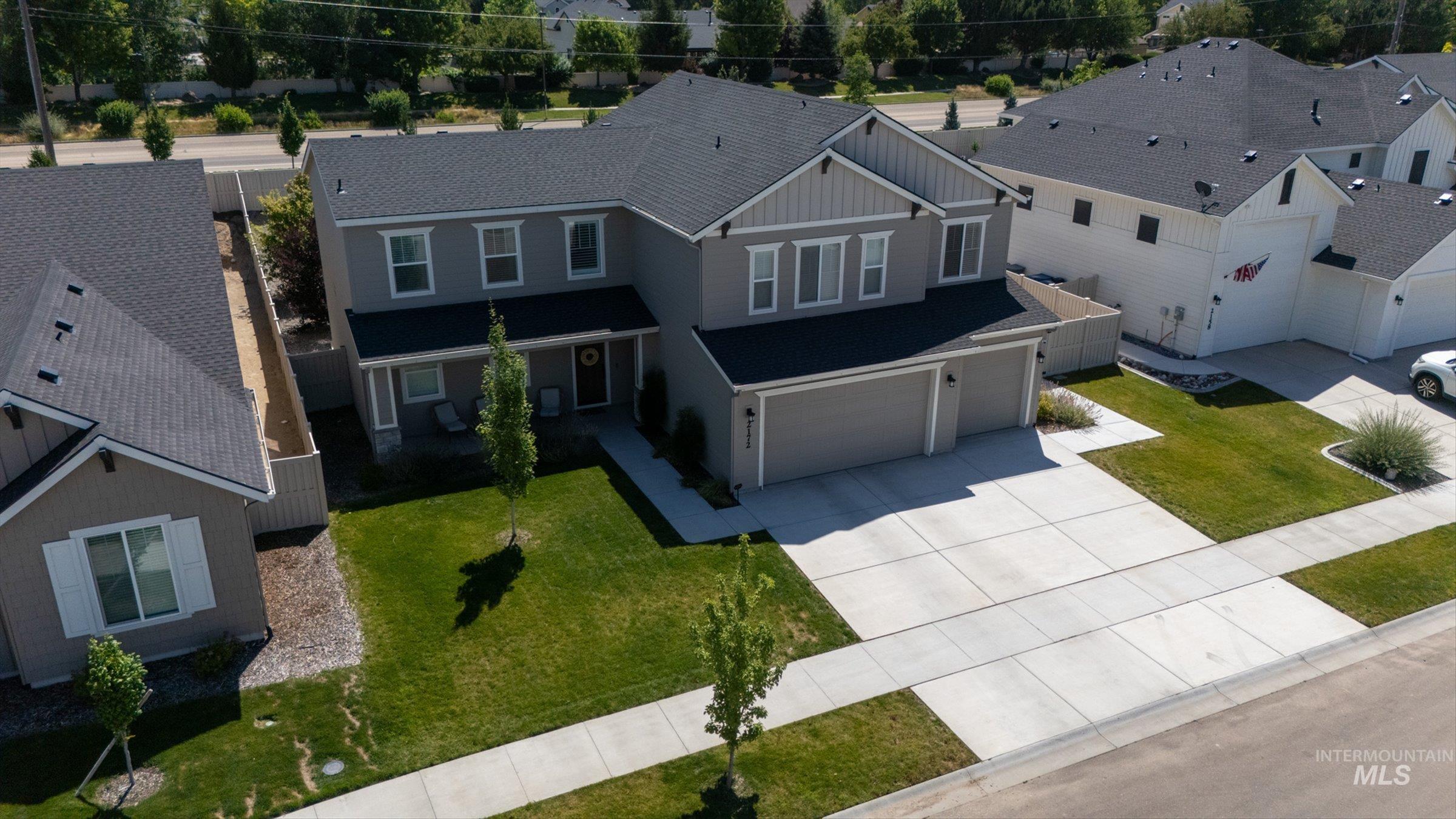 2172 Savoy Court Middleton, ID 83644 - Photo 36 of 46 Two-story residence featuring a gray exterior with white trim accents