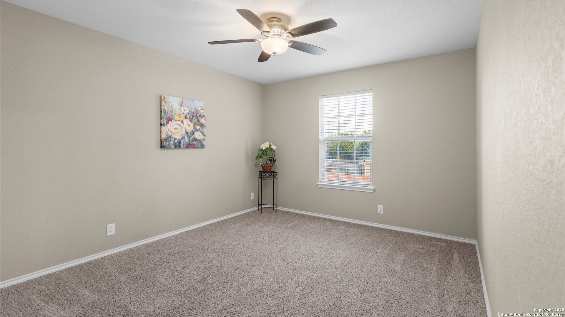 9009 Peridot Schertz, TX 78154 - Photo 16 of 28 a view of an empty room with a window