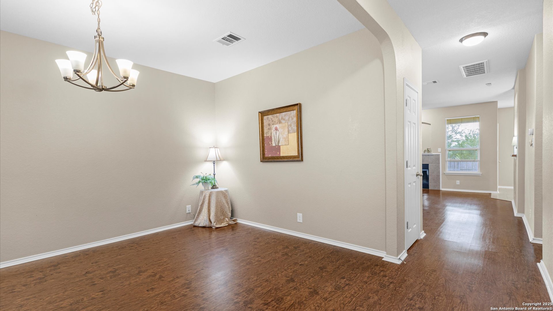 9009 Peridot Schertz, TX 78154 - Photo 6 of 28 a view of empty room with wooden floor