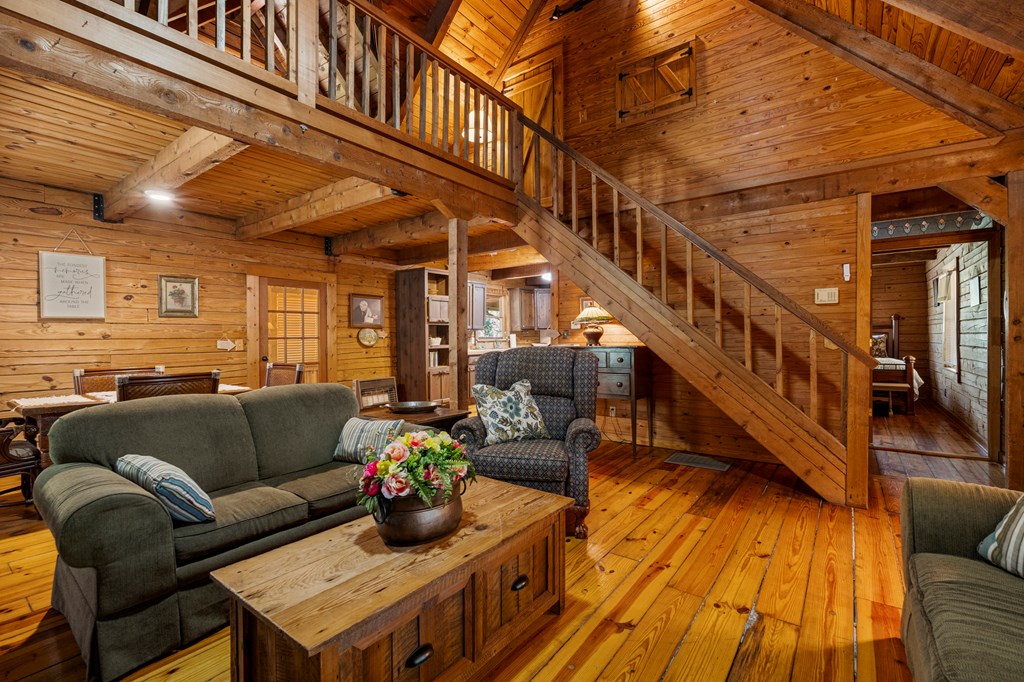299 South L Street Hamilton, GA 31811 - Photo 3 of 36 a living room with furniture and a wooden floor