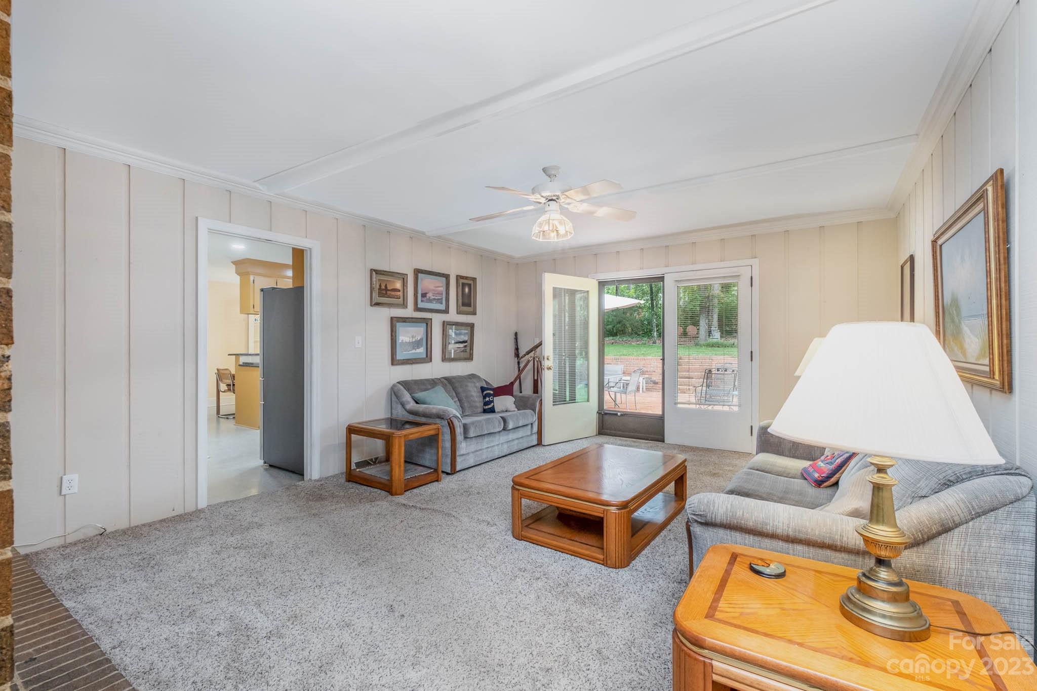 5901 Gate Post Road Charlotte, NC 28211 - Photo 19 of 41 a living room with furniture and a large window