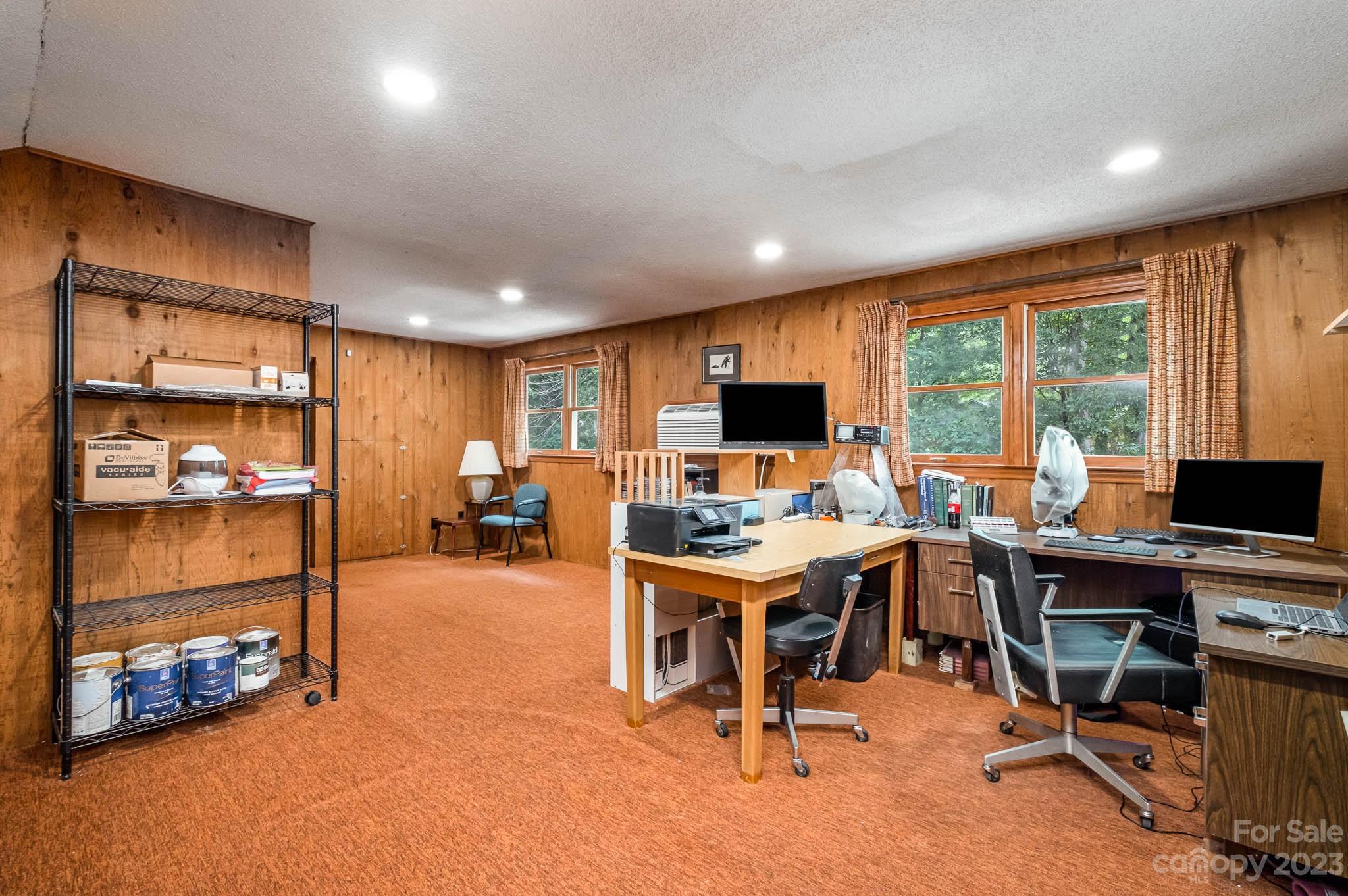 5901 Gate Post Road Charlotte, NC 28211 - Photo 31 of 41 a view of a workspace with furniture and a window