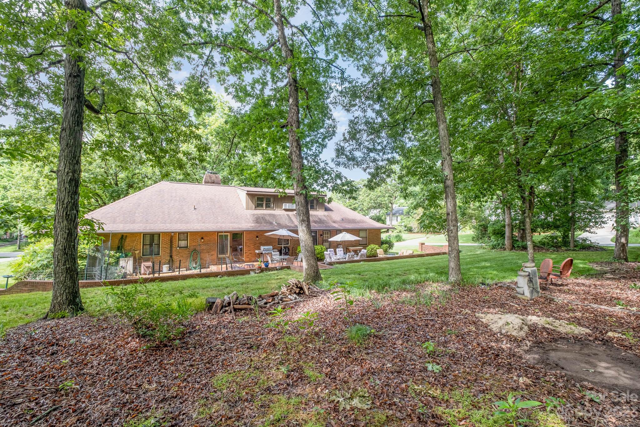 5901 Gate Post Road Charlotte, NC 28211 - Photo 33 of 41 a view of a house with backyard and garden
