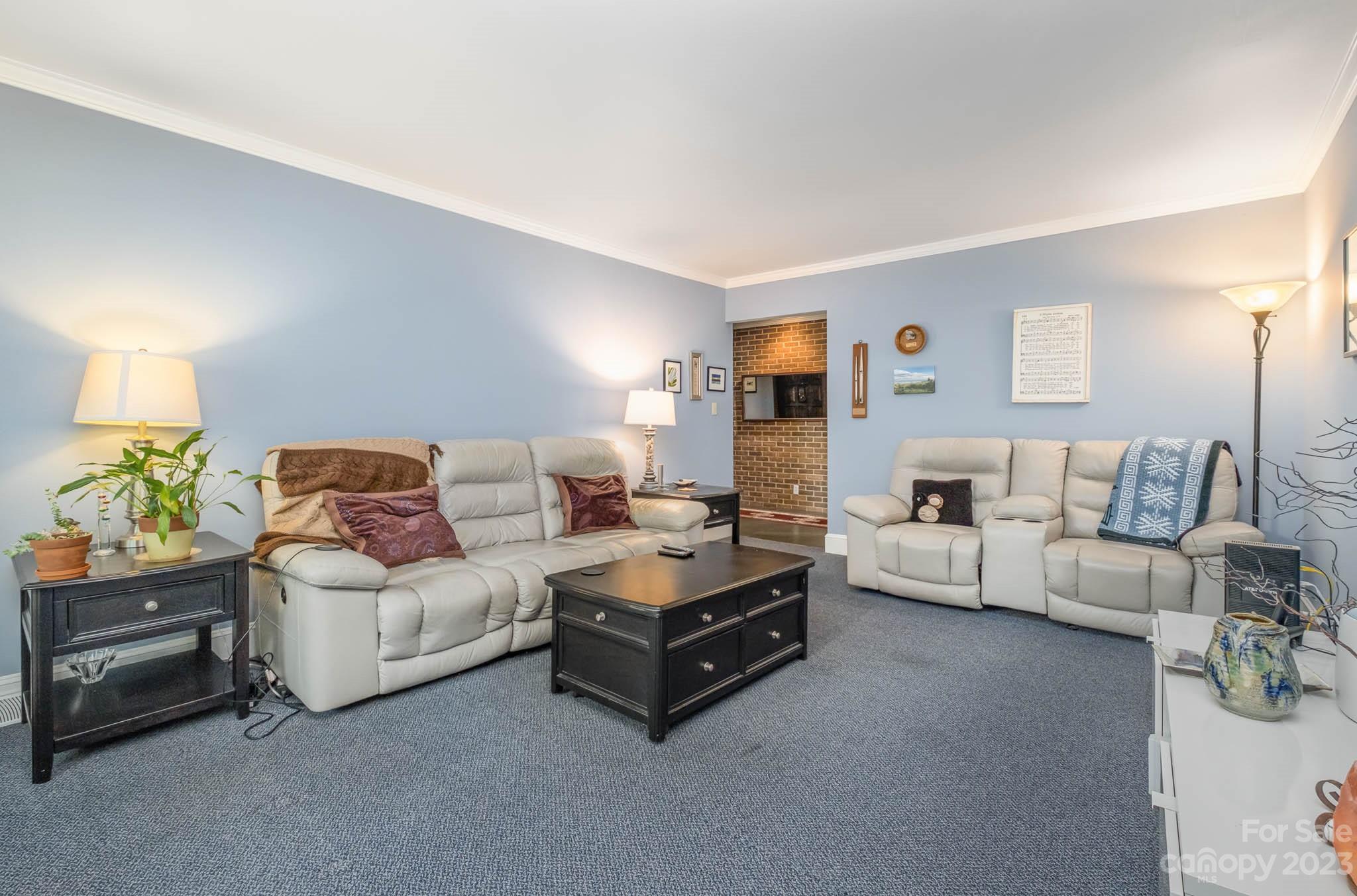 5901 Gate Post Road Charlotte, NC 28211 - Photo 10 of 41 a living room with furniture and a couch