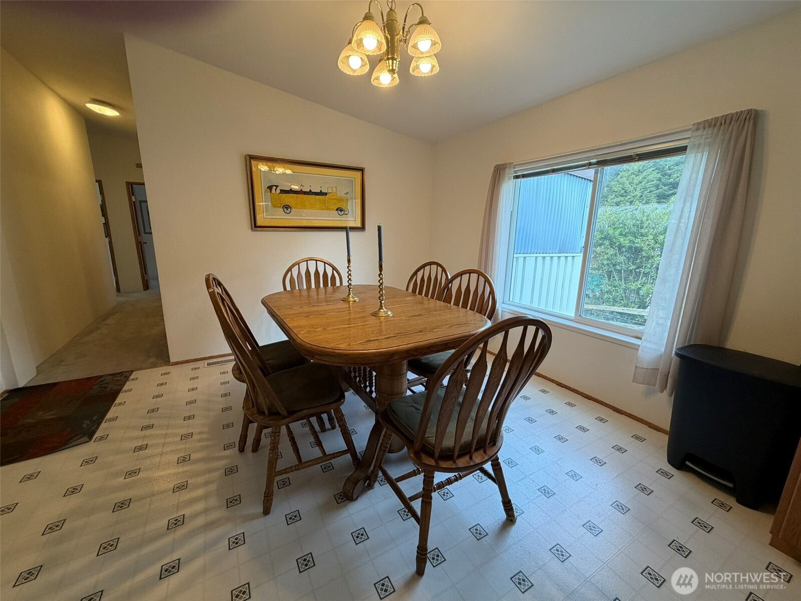 17 Rustemeyer Road, Unit 19 Aberdeen, WA 98520 - Photo 11 of 39 a view of a dining room with furniture and wooden floor