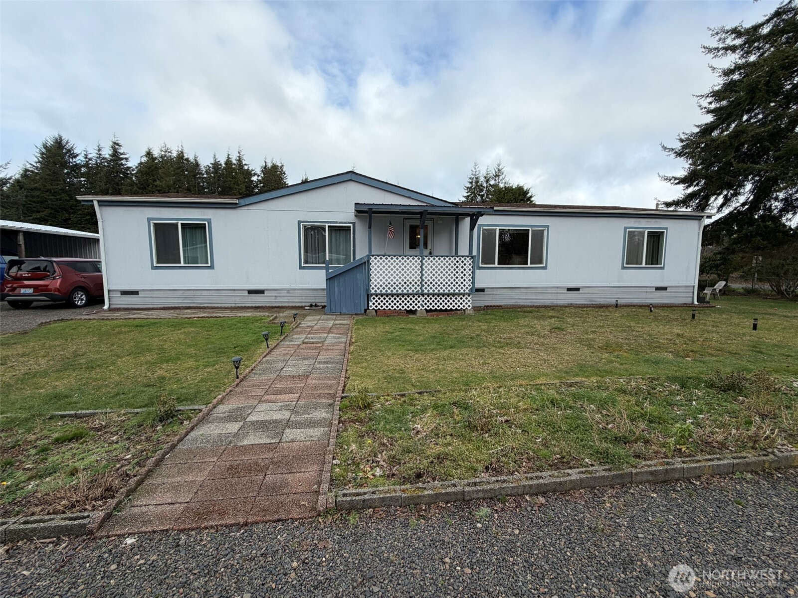 17 Rustemeyer Road, Unit 19 Aberdeen, WA 98520 - Photo 2 of 39 a house with trees in the background