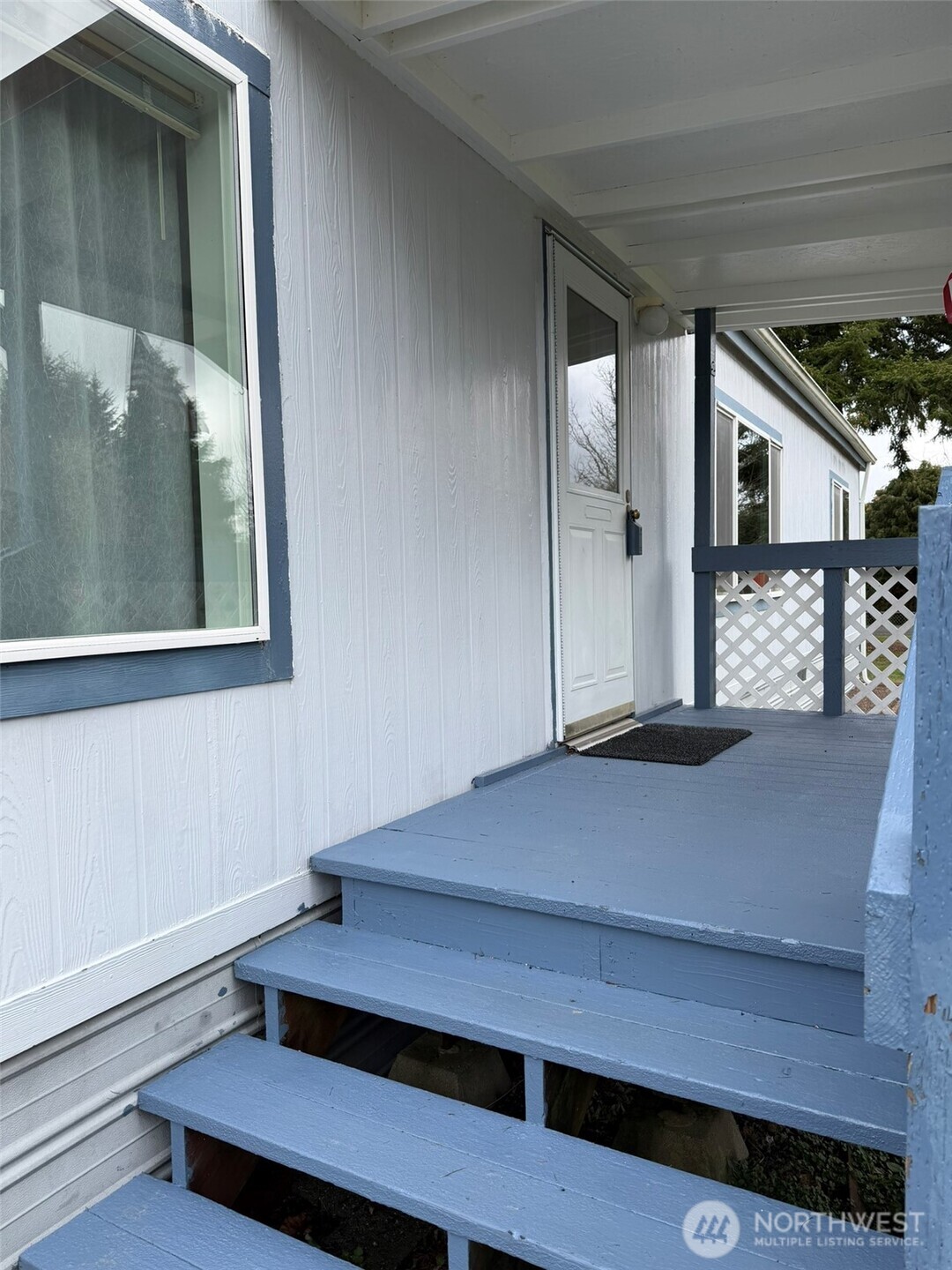 17 Rustemeyer Road, Unit 19 Aberdeen, WA 98520 - Photo 3 of 39 a view of room with window and wooden floor