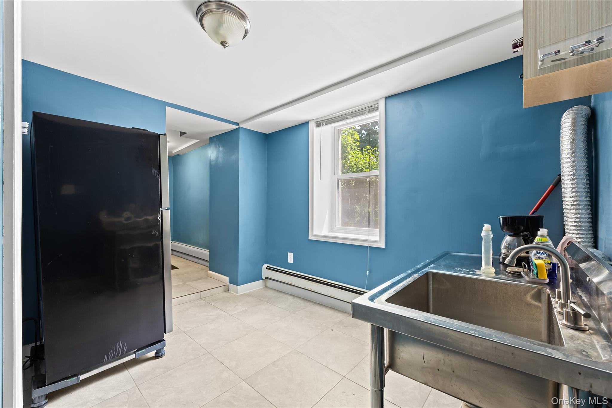 4114 Wickham Avenue Bronx, NY 10466 - Photo 17 of 27 a bathroom with a sink and a shower