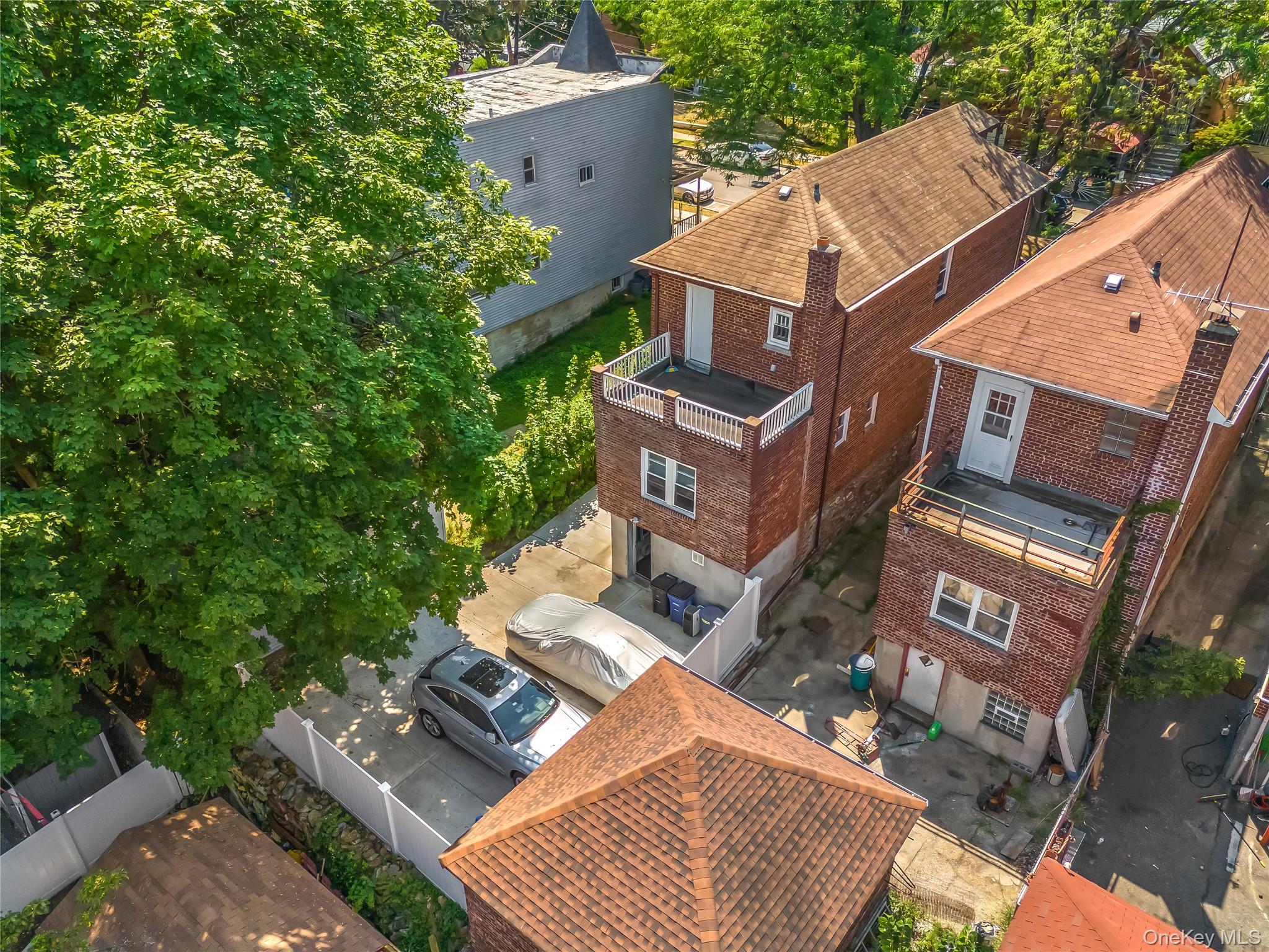 4114 Wickham Avenue Bronx, NY 10466 - Photo 23 of 27 aerial view of a house with a yard