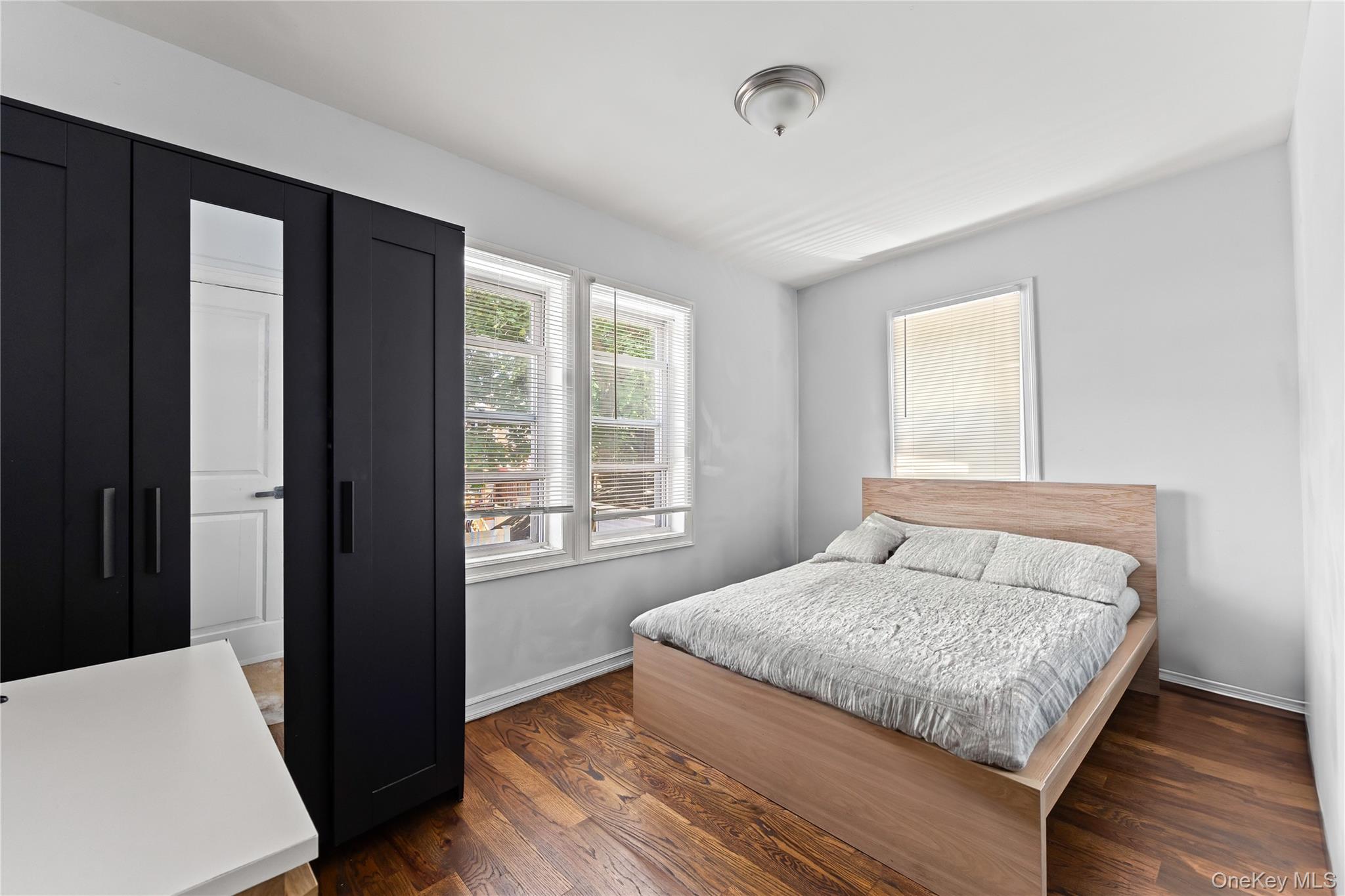 4114 Wickham Avenue Bronx, NY 10466 - Photo 6 of 27 a bedroom with a bed and a window