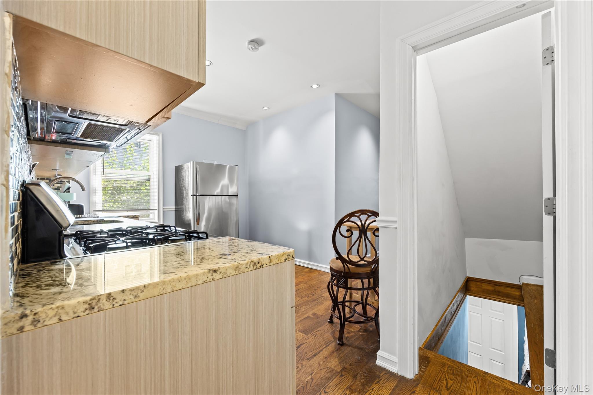 4114 Wickham Avenue Bronx, NY 10466 - Photo 10 of 27 a kitchen with sink refrigerator and stove