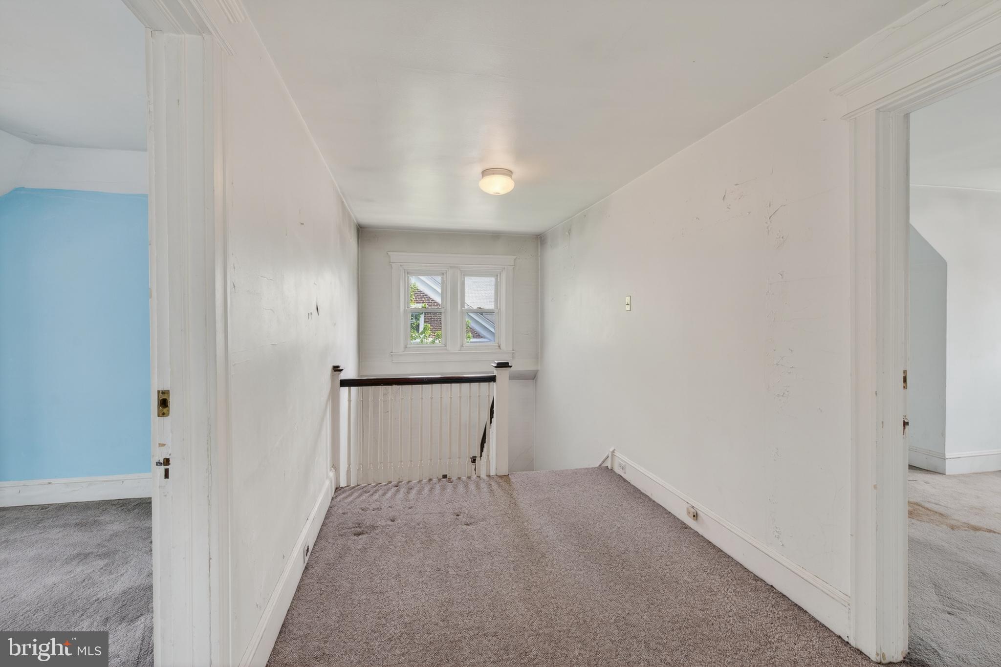 705 East 20th Street Chester, PA 19013 - Photo 14 of 41 a view of empty room with wooden floor