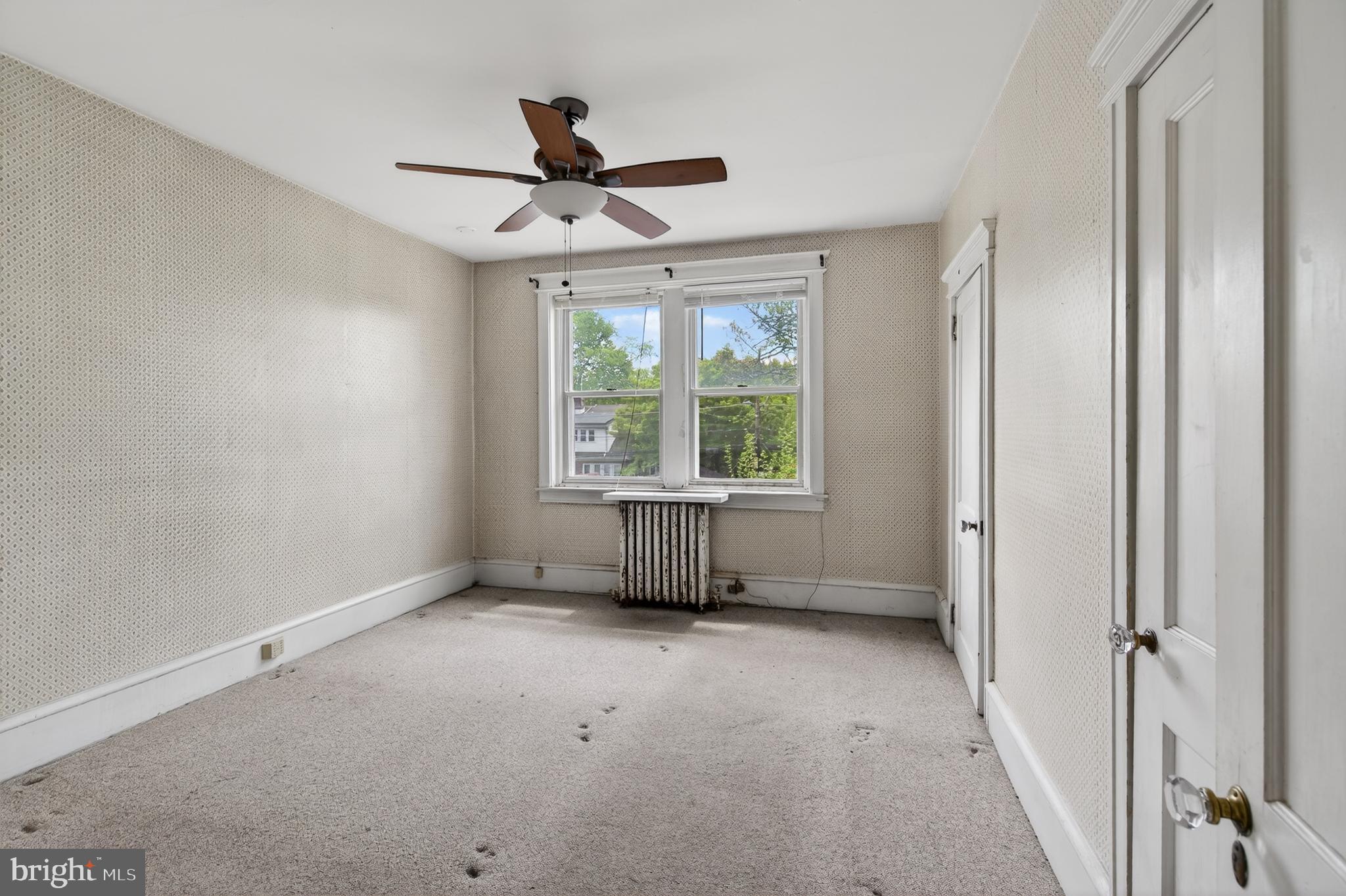 705 East 20th Street Chester, PA 19013 - Photo 19 of 41 a view of an empty room with a window