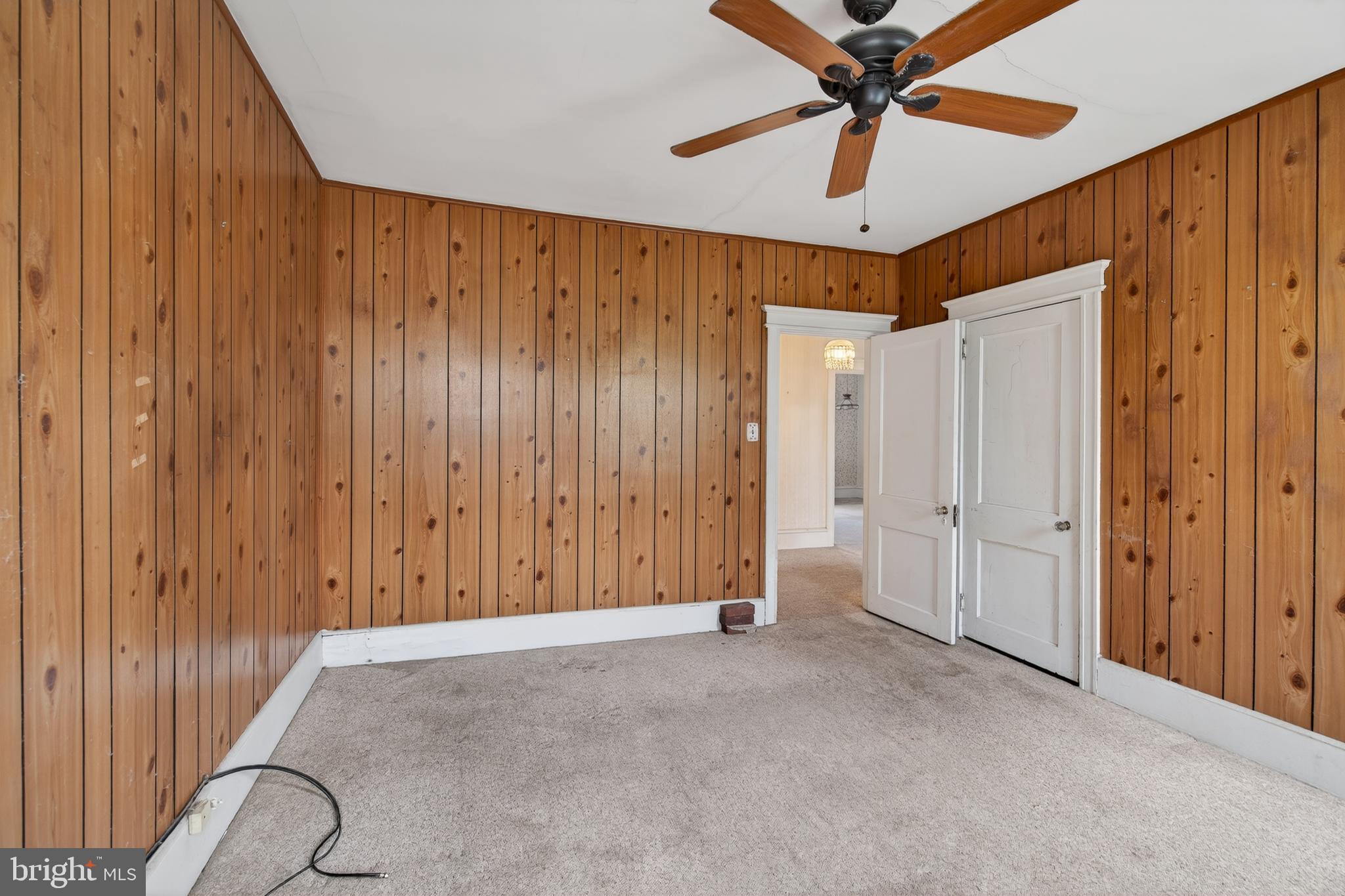 705 East 20th Street Chester, PA 19013 - Photo 22 of 41 a view of a room with a chandelier fan