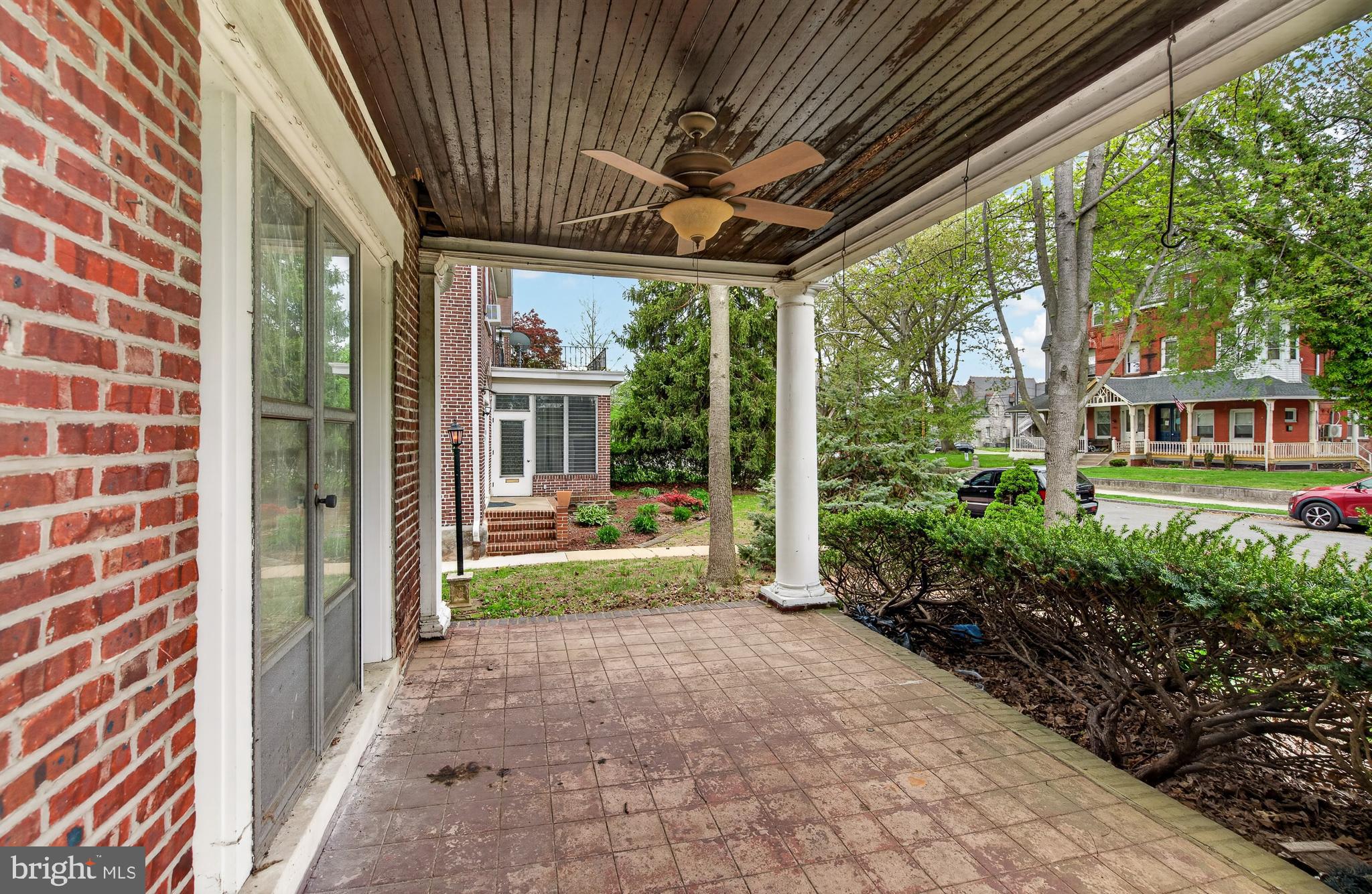 705 East 20th Street Chester, PA 19013 - Photo 3 of 41 a view of a porch with furniture and garden