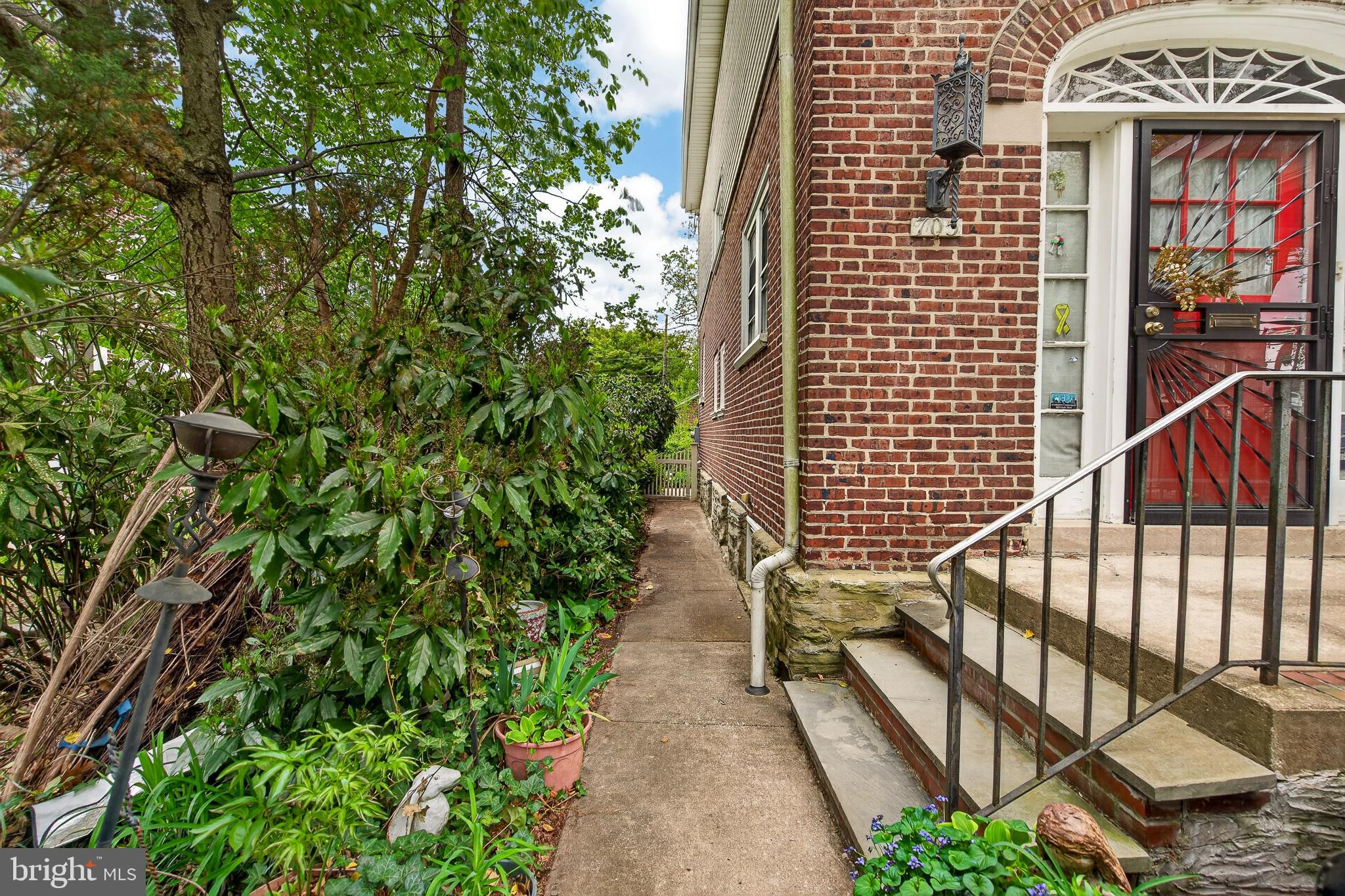 705 East 20th Street Chester, PA 19013 - Photo 32 of 41 a view of a pathway that has an outdoor space