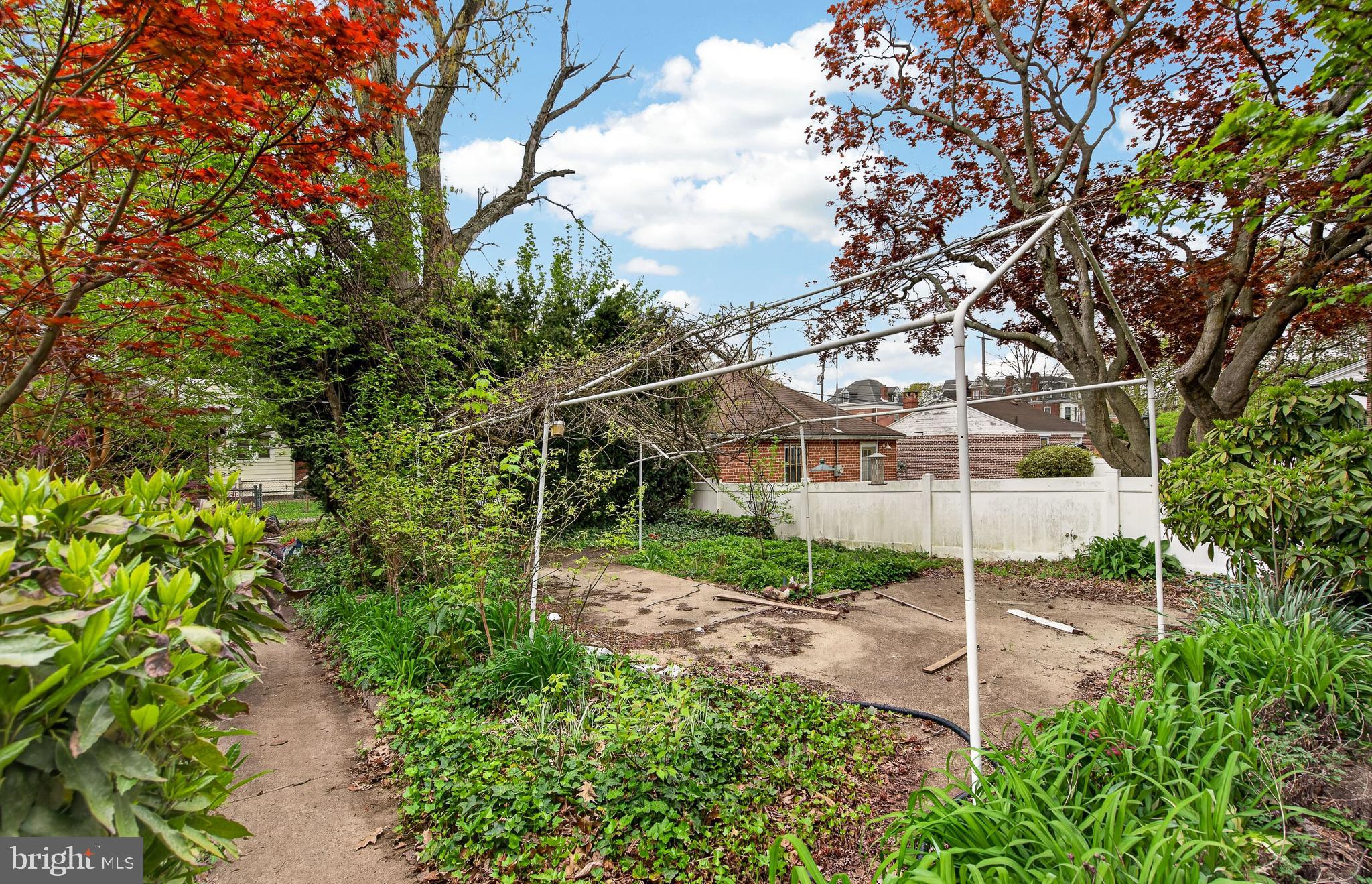 705 East 20th Street Chester, PA 19013 - Photo 36 of 41 a backyard of a house with lots of green space
