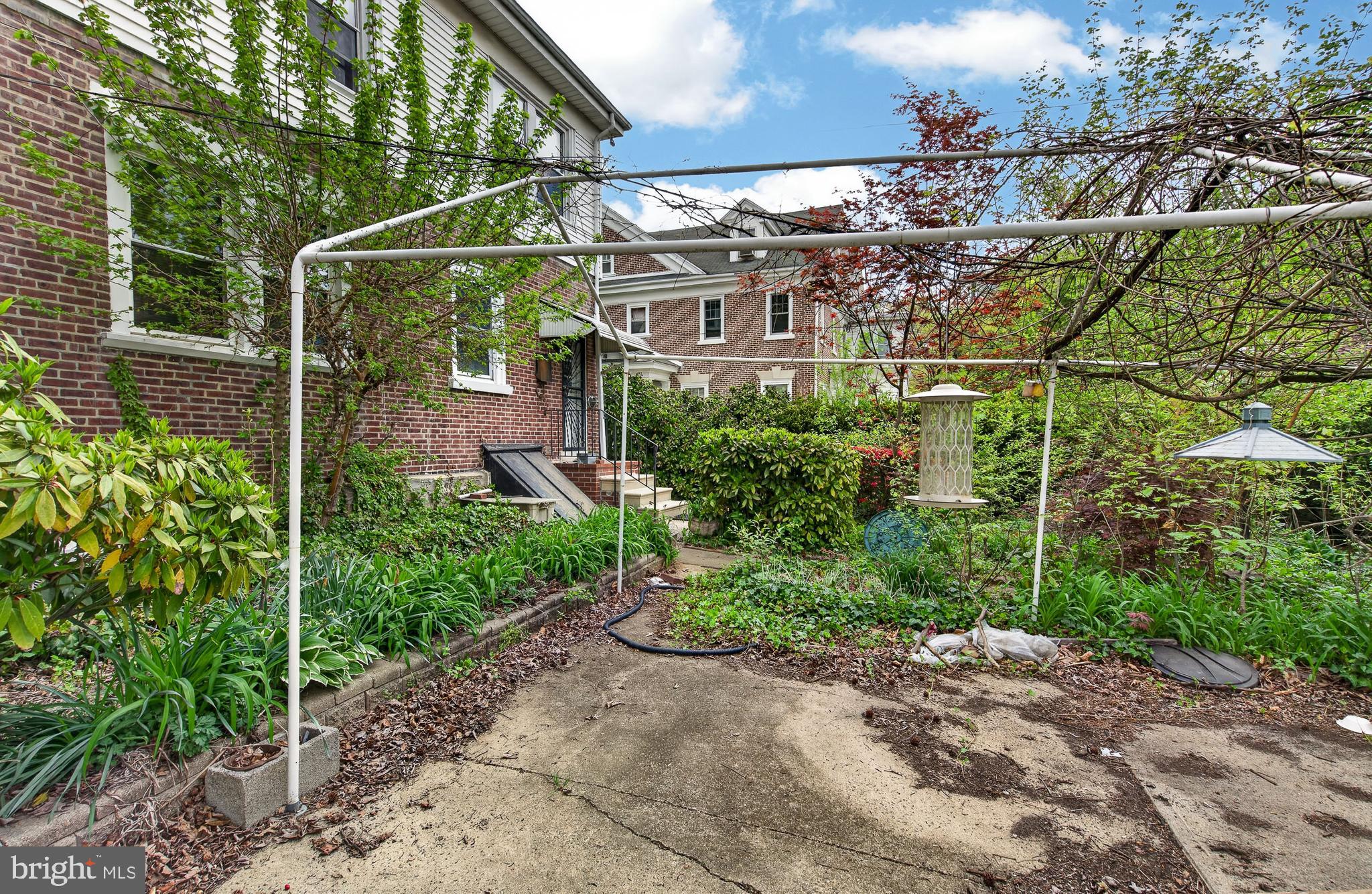 705 East 20th Street Chester, PA 19013 - Photo 37 of 41 a view of a building with a garden