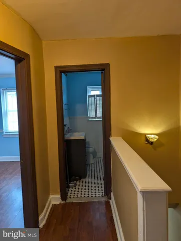 a view of balcony with wooden floor