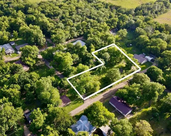 an aerial view of a residential houses