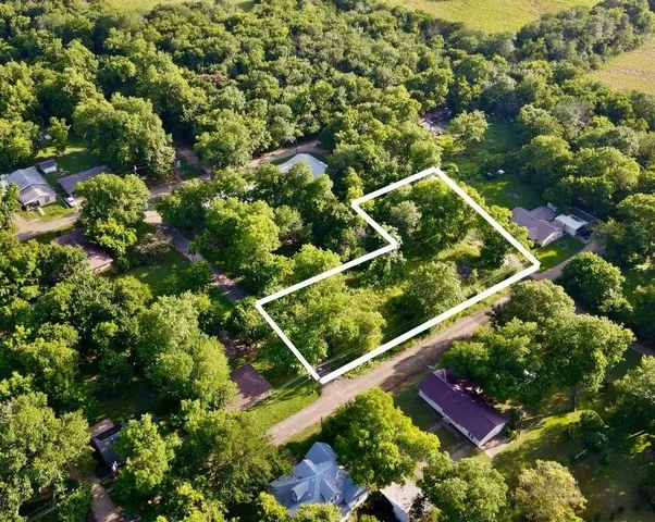 an aerial view of a residential houses