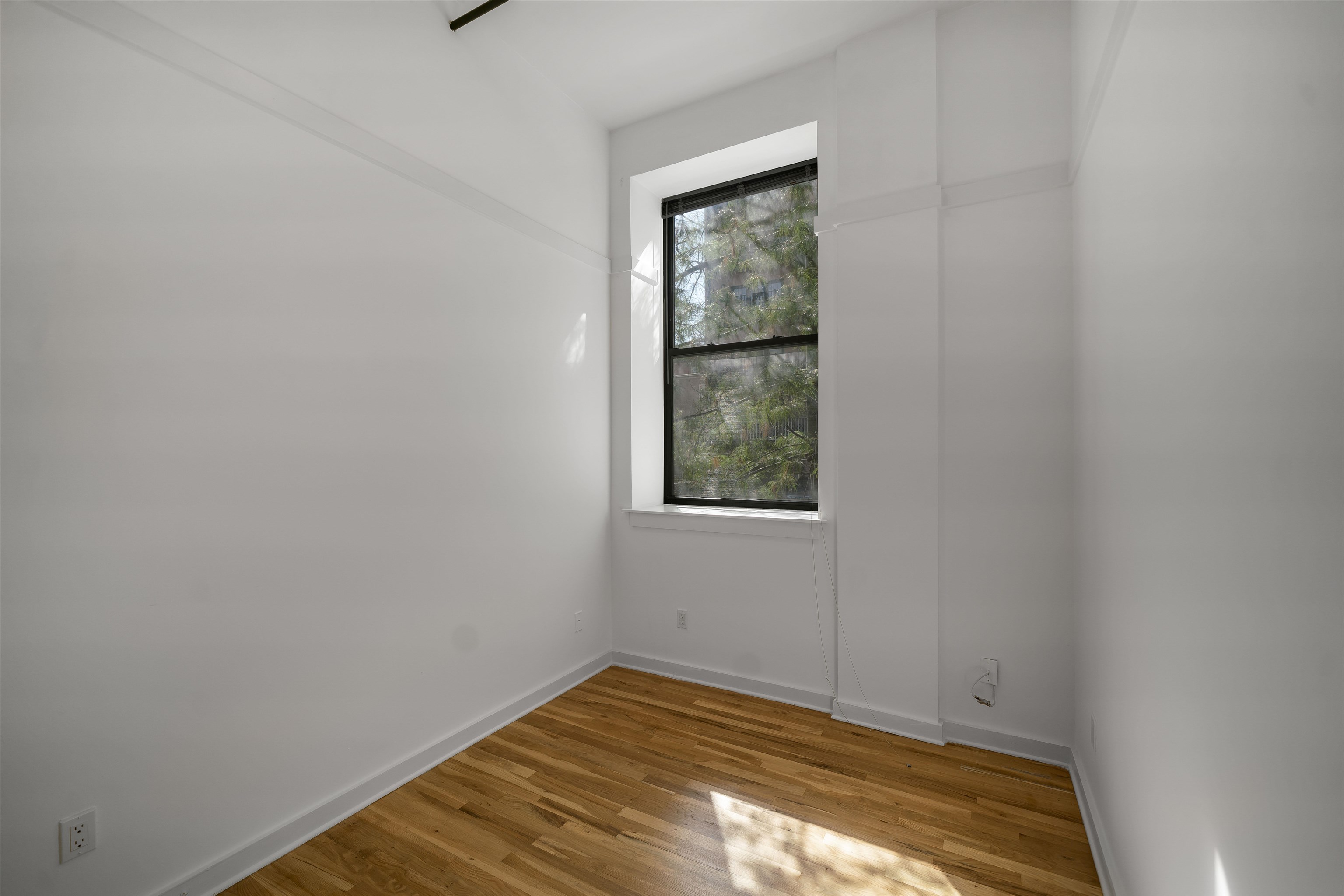 1015 Clinton Street, Unit 204 Hoboken, NJ 07030 - Photo 11 of 22 a view of empty room with window