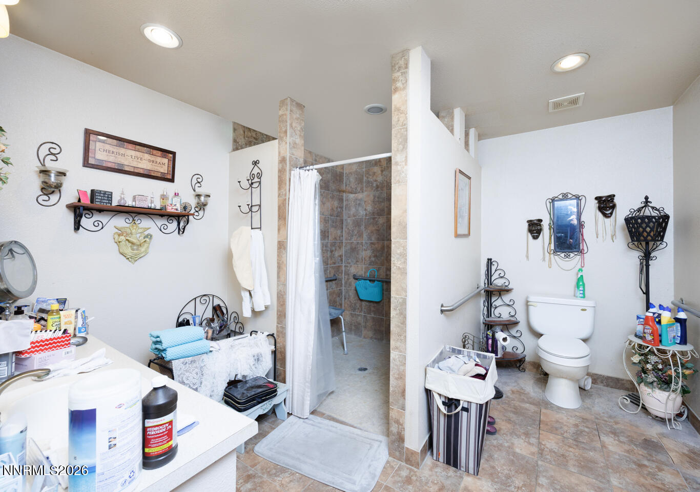 2000 Trails End Fallon, NV 89406 - Photo 11 of 20 a white bath tub sitting next to a white sink and a table