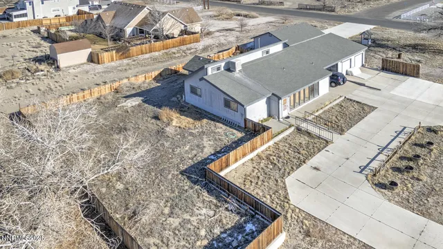 an aerial view of a house with a bed