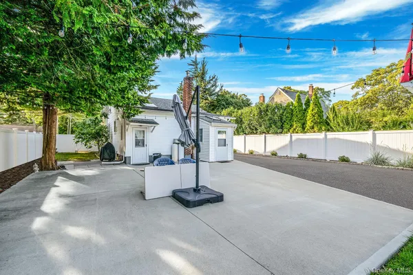 a view of a house with a street