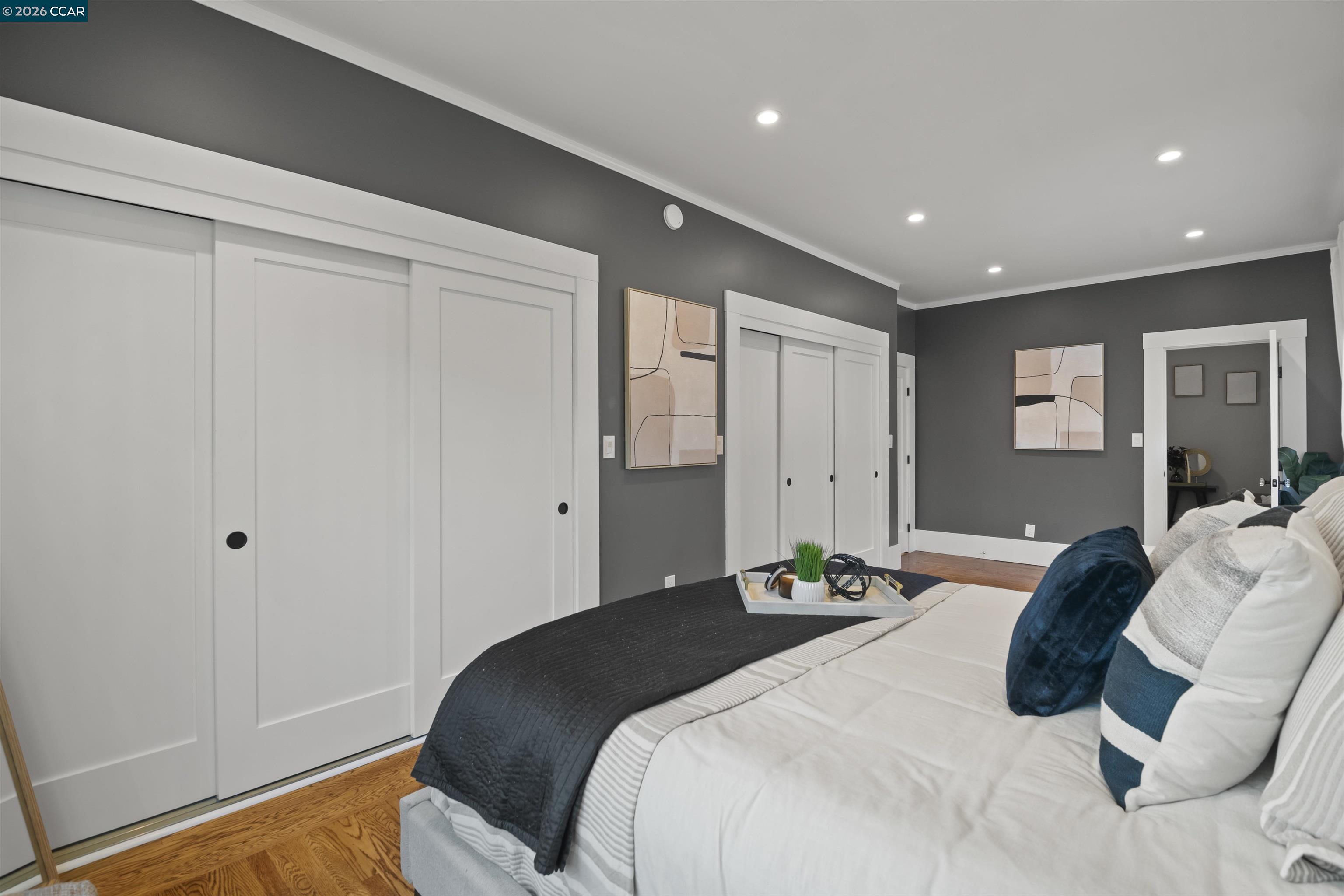 5428 Ruth Avenue Oakland, CA 94601 - Photo 13 of 17 a bedroom with a bed and a window