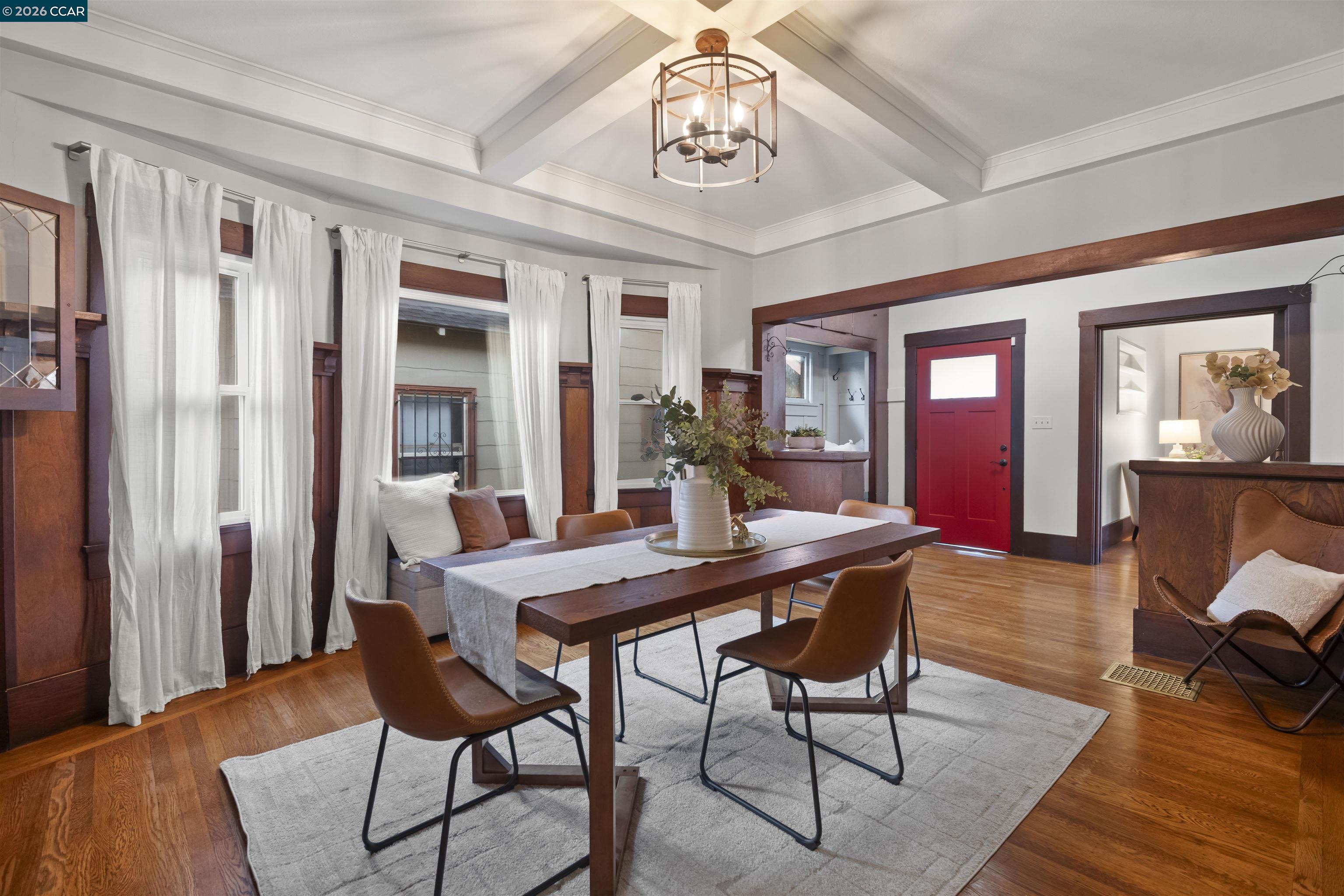 5428 Ruth Avenue Oakland, CA 94601 - Photo 6 of 17 a view of a dining room with furniture window and wooden floor