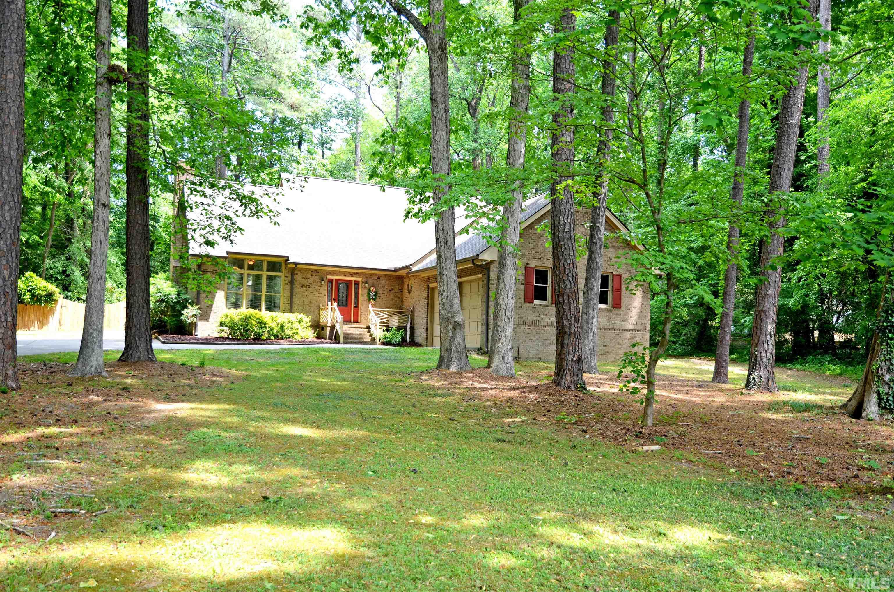 4907 Old Elizabeth Road Raleigh, NC 27616 - Photo 21 of 30 a front view of a house with a yard