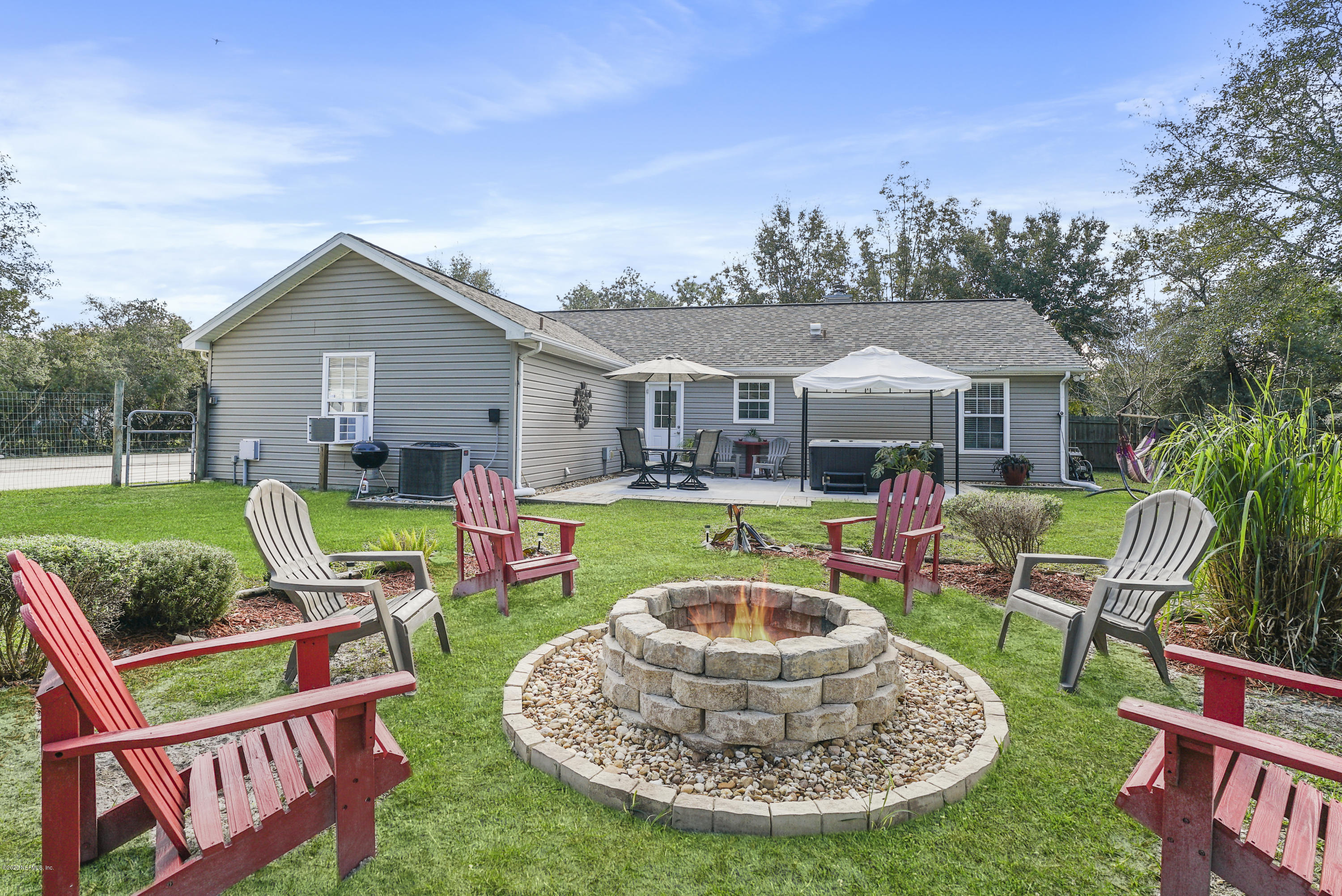 4914 Vogel Road St. Augustine, FL 32092 - Photo 2 of 47 Backyard with Fire Pit