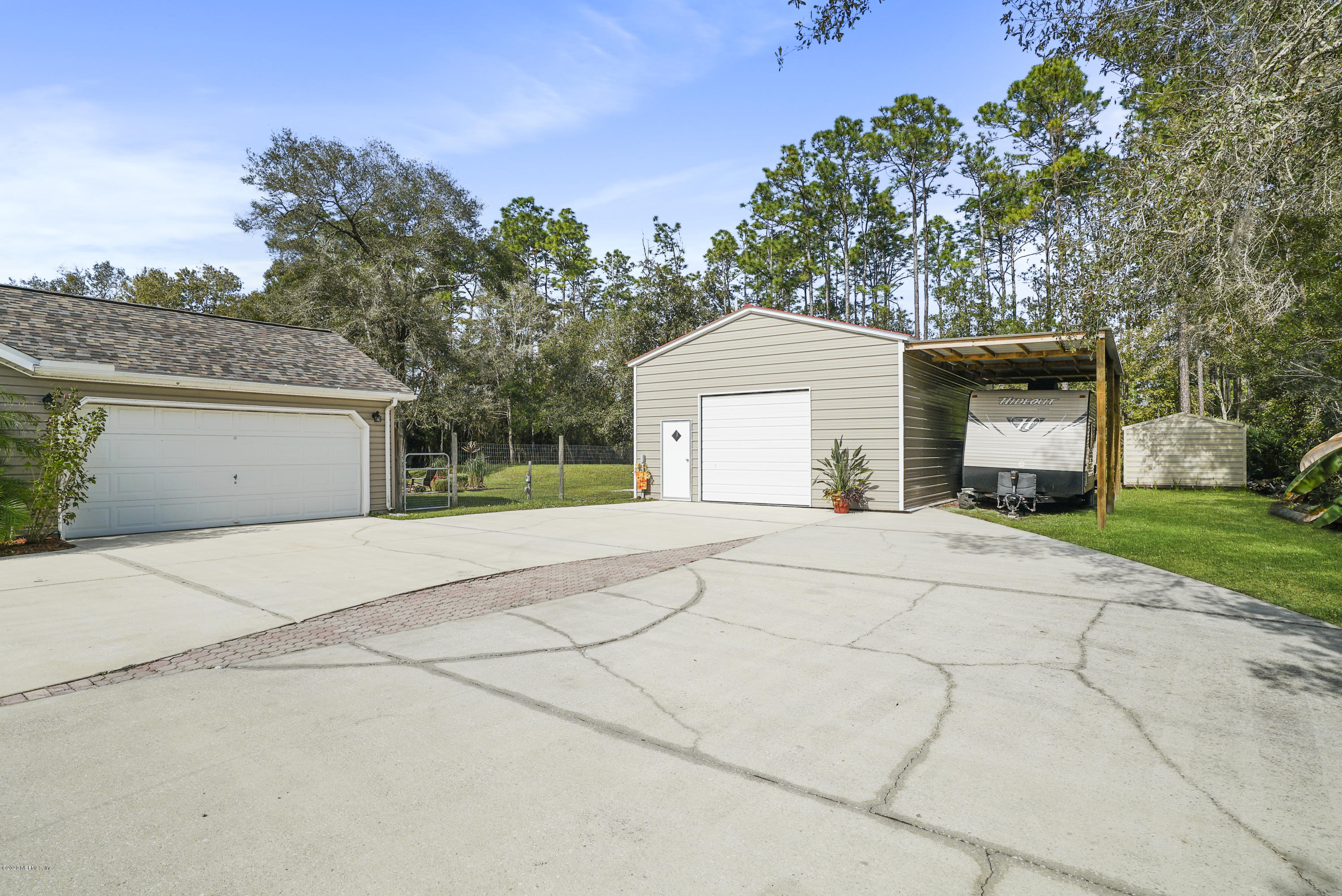 4914 Vogel Road St. Augustine, FL 32092 - Photo 34 of 47 Barn/Workshop with covered parking