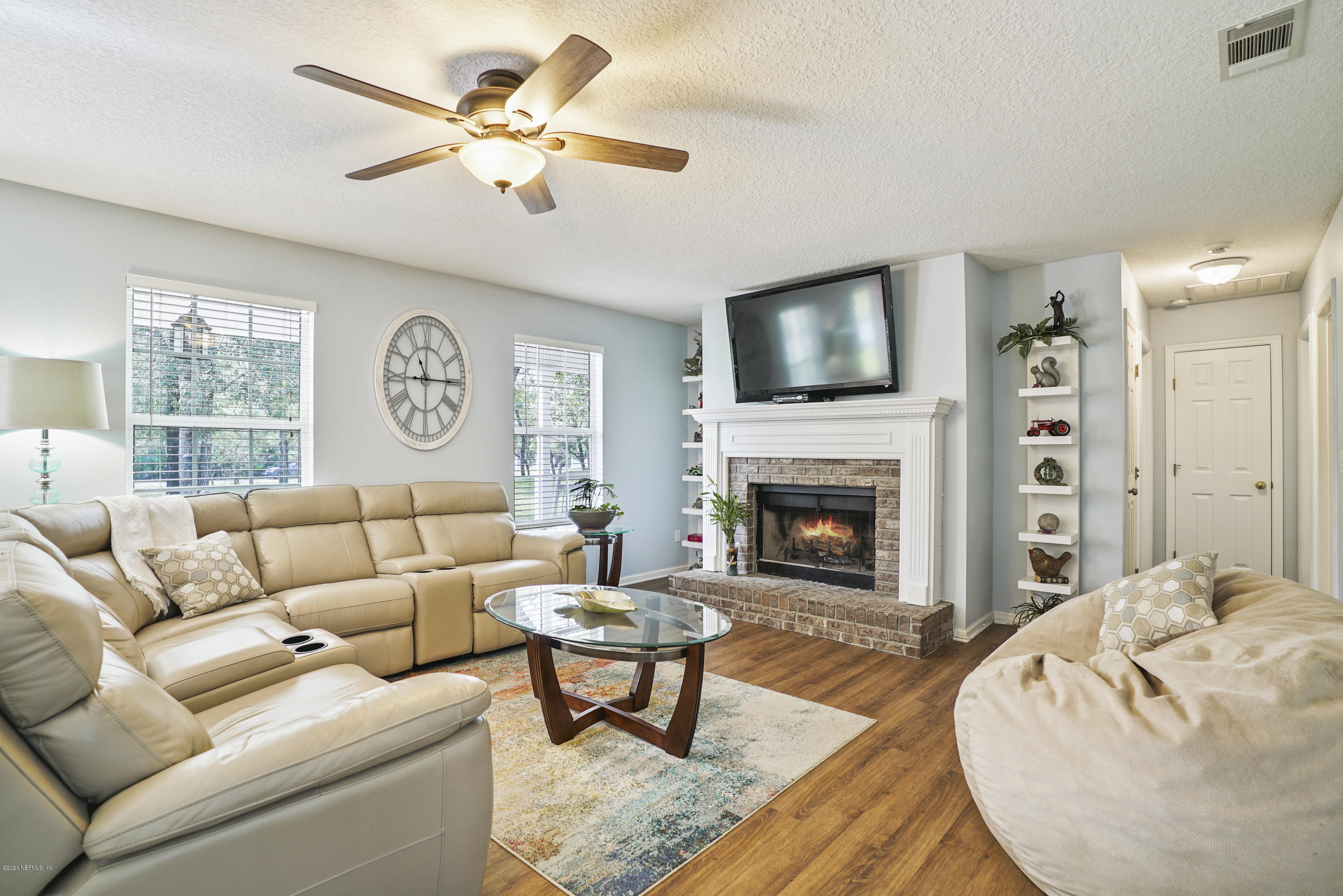 4914 Vogel Road St. Augustine, FL 32092 - Photo 5 of 47 Well lit Family Room w/ Fire Place