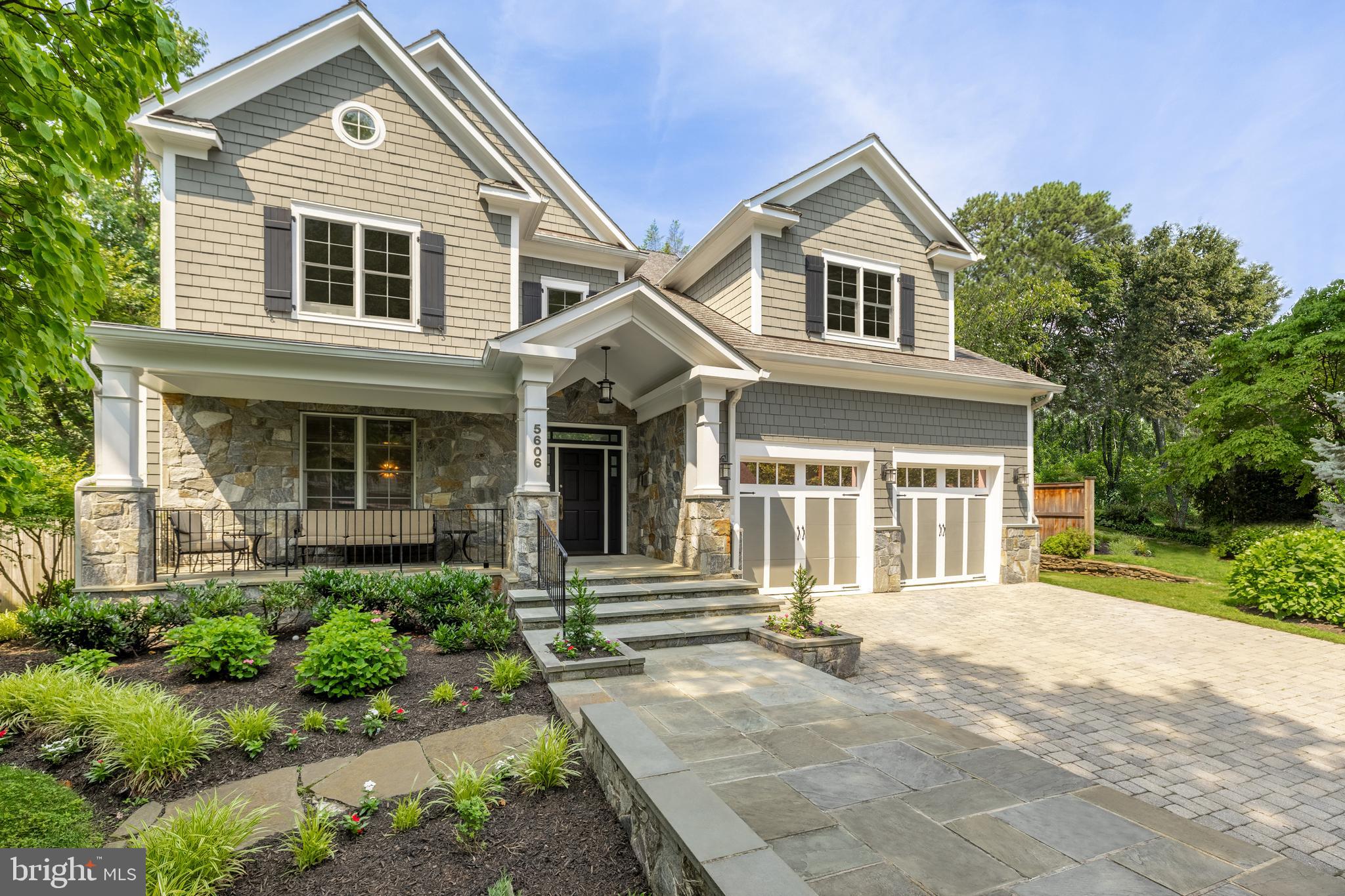 5606 Parkston Road Bethesda, MD 20816 - Photo 2 of 50 front view of a house with a yard