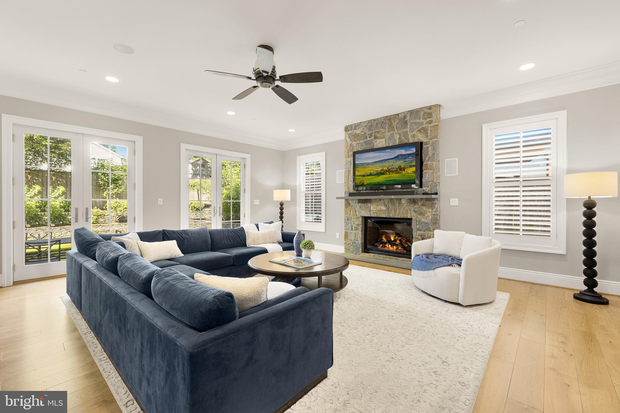 5606 Parkston Road Bethesda, MD 20816 - Photo 24 of 50 a living room with furniture fireplace and window