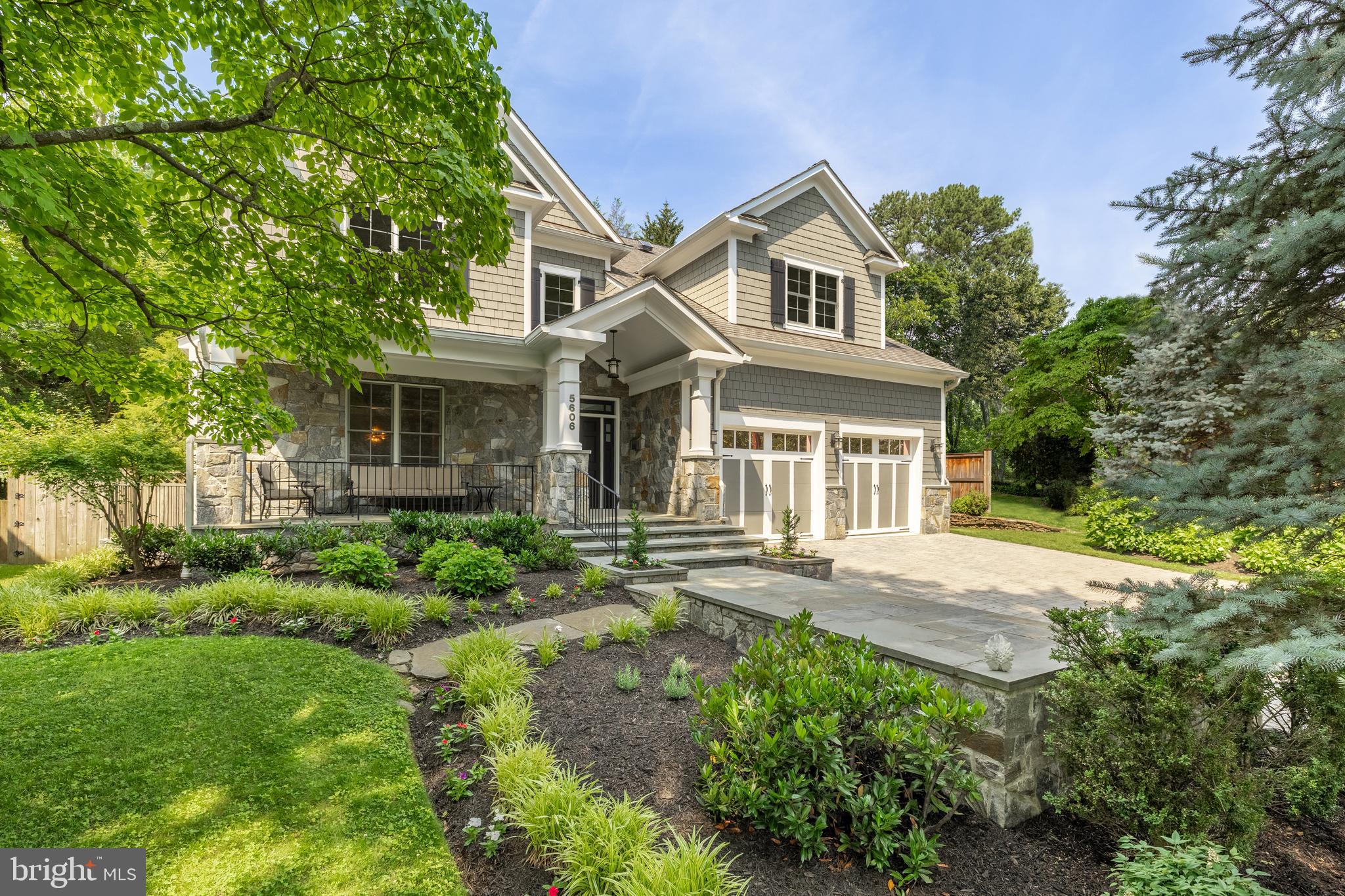 5606 Parkston Road Bethesda, MD 20816 - Photo 3 of 50 front view of a house with a yard