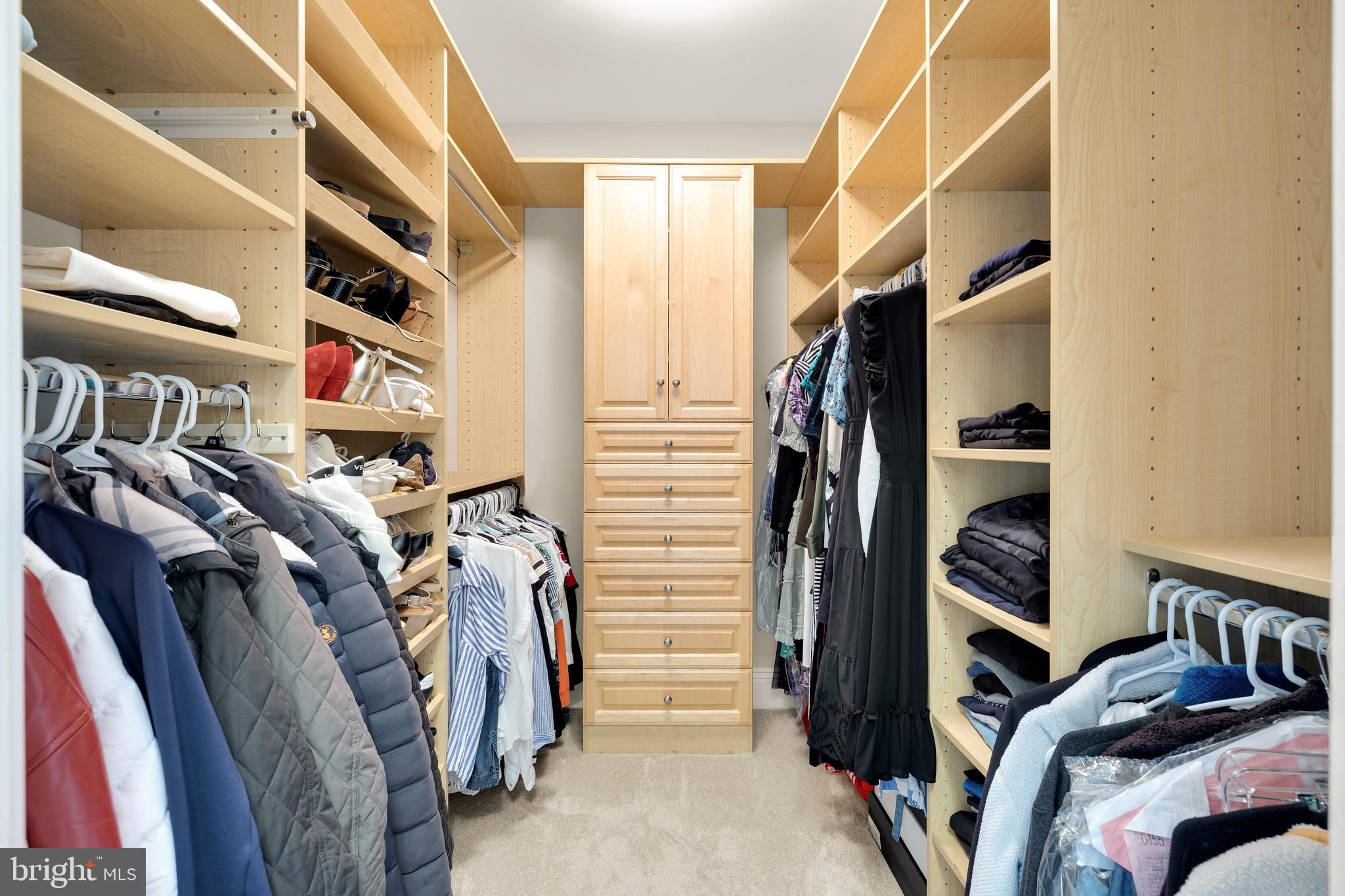 5606 Parkston Road Bethesda, MD 20816 - Photo 33 of 50 a view of walk in closet with clothes and shoes