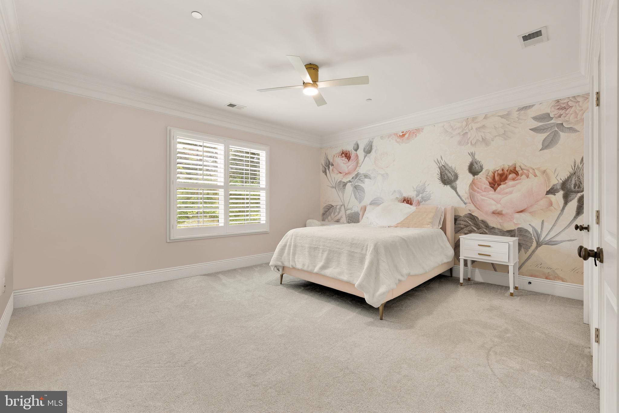 5606 Parkston Road Bethesda, MD 20816 - Photo 37 of 50 a bedroom with a bed and a couch