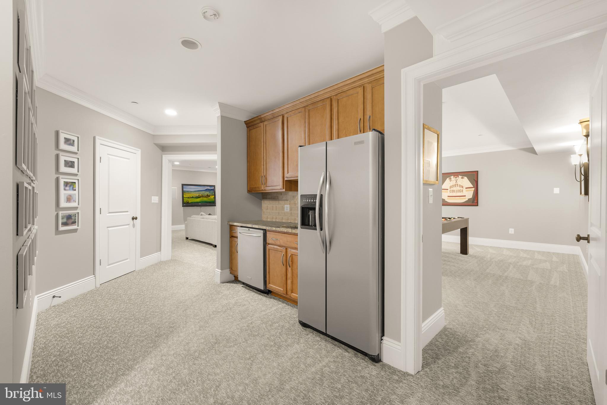 5606 Parkston Road Bethesda, MD 20816 - Photo 43 of 50 a kitchen with refrigerator and window