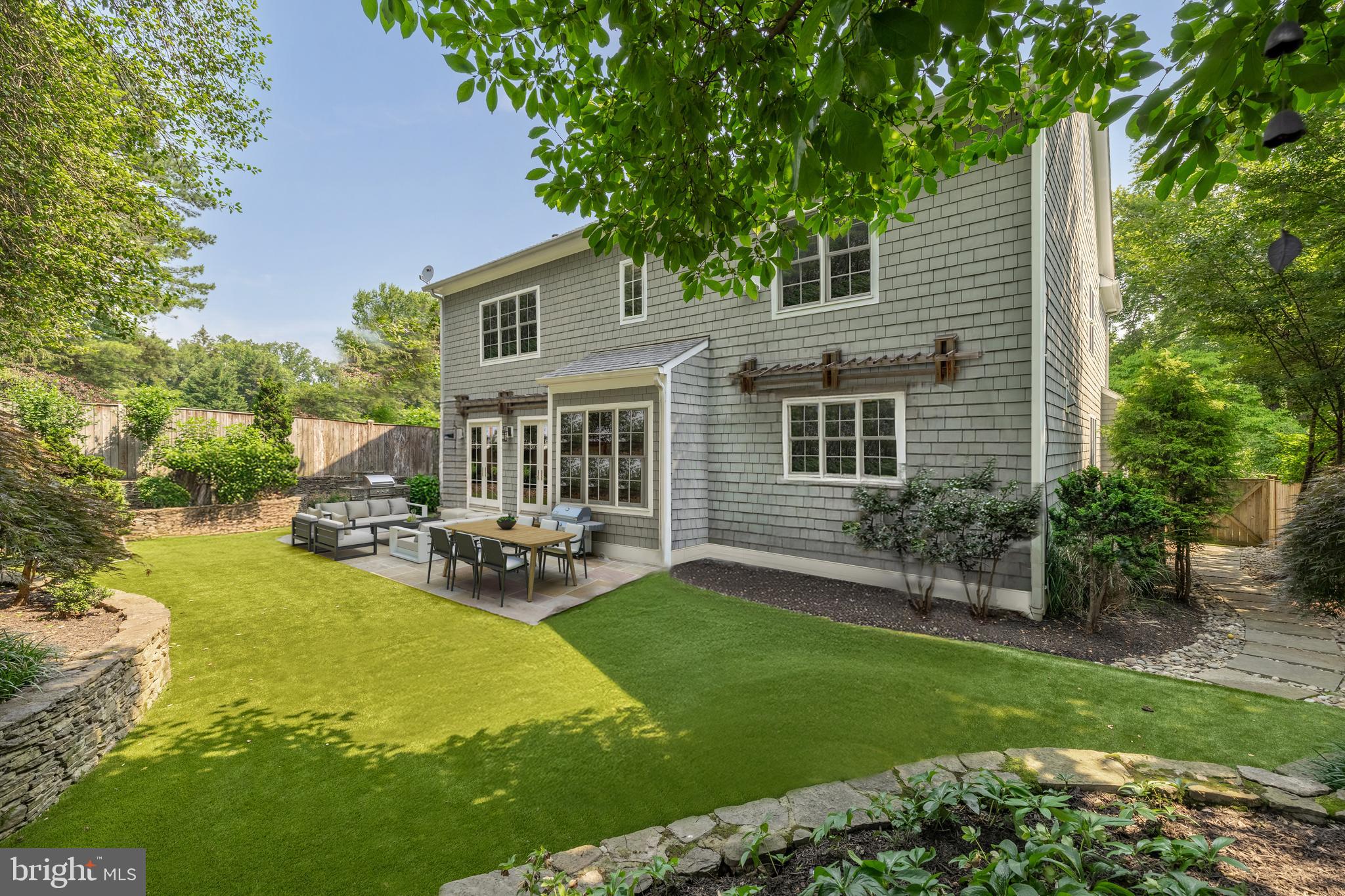 5606 Parkston Road Bethesda, MD 20816 - Photo 49 of 50 a view of a house with backyard porch and sitting area