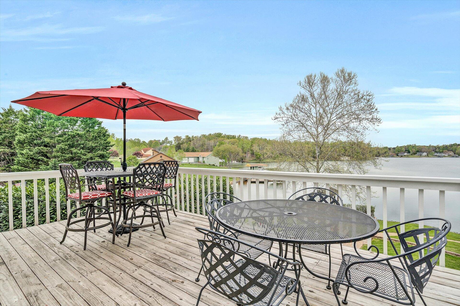 515 Cedar Ridge Road Union Hall, VA 24176 - Photo 18 of 51 a view of a balcony with table and chairs